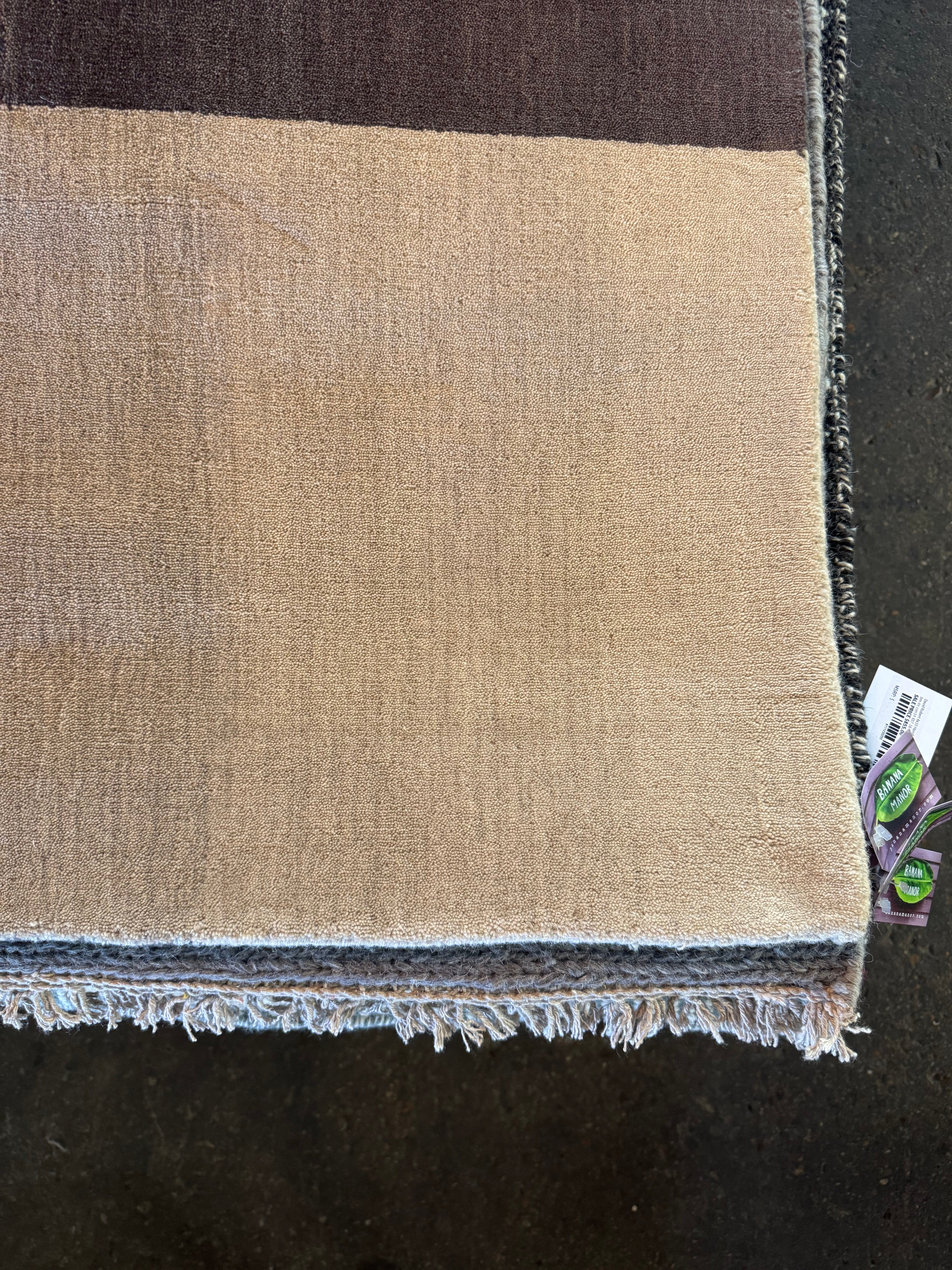 Mansker 6.9x10 Handwoven Modern Brown and Grey