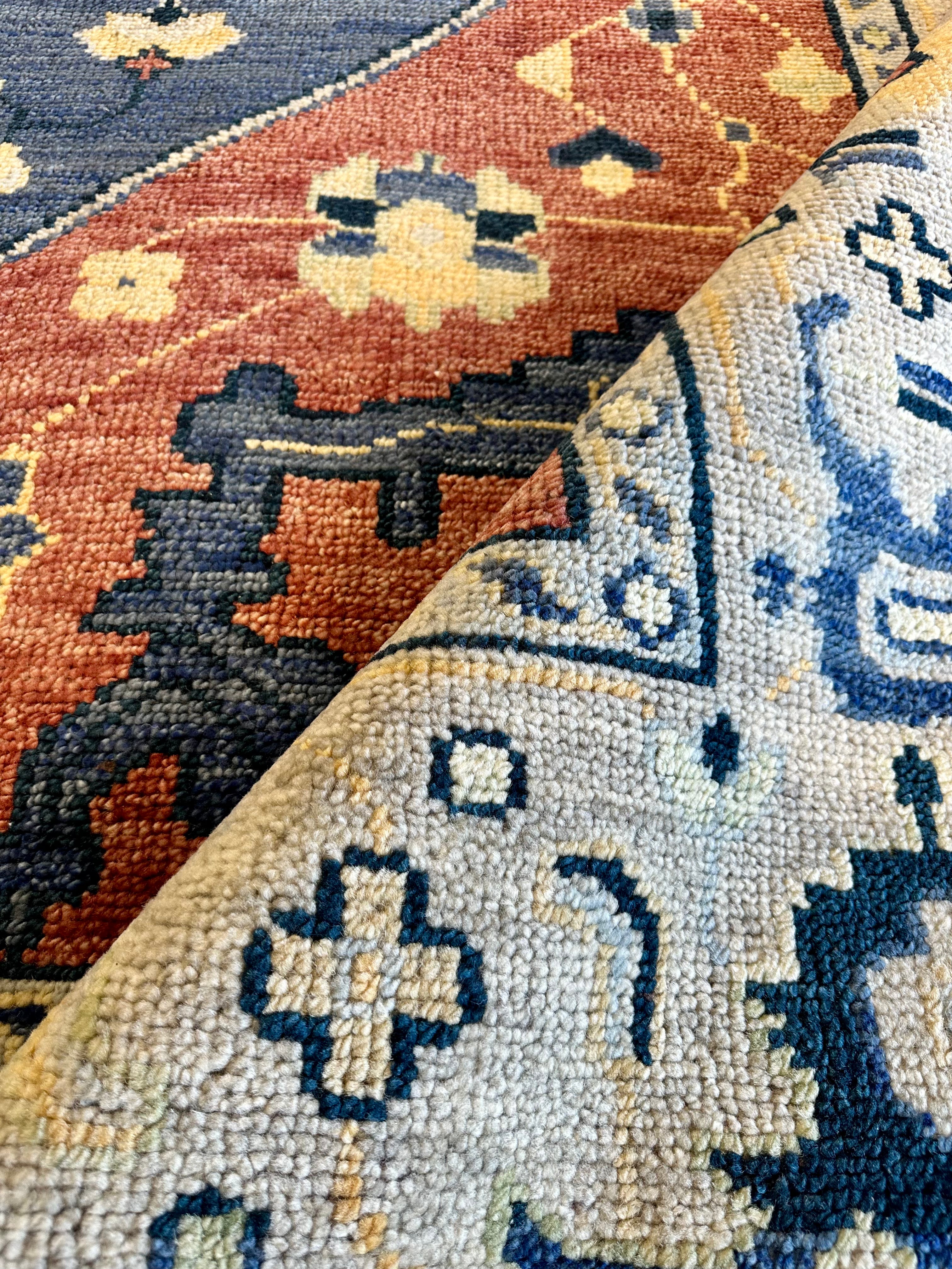 Kitty 9x12  Rust, Blue, and Tan Hand-Knotted Indo Persian Rug