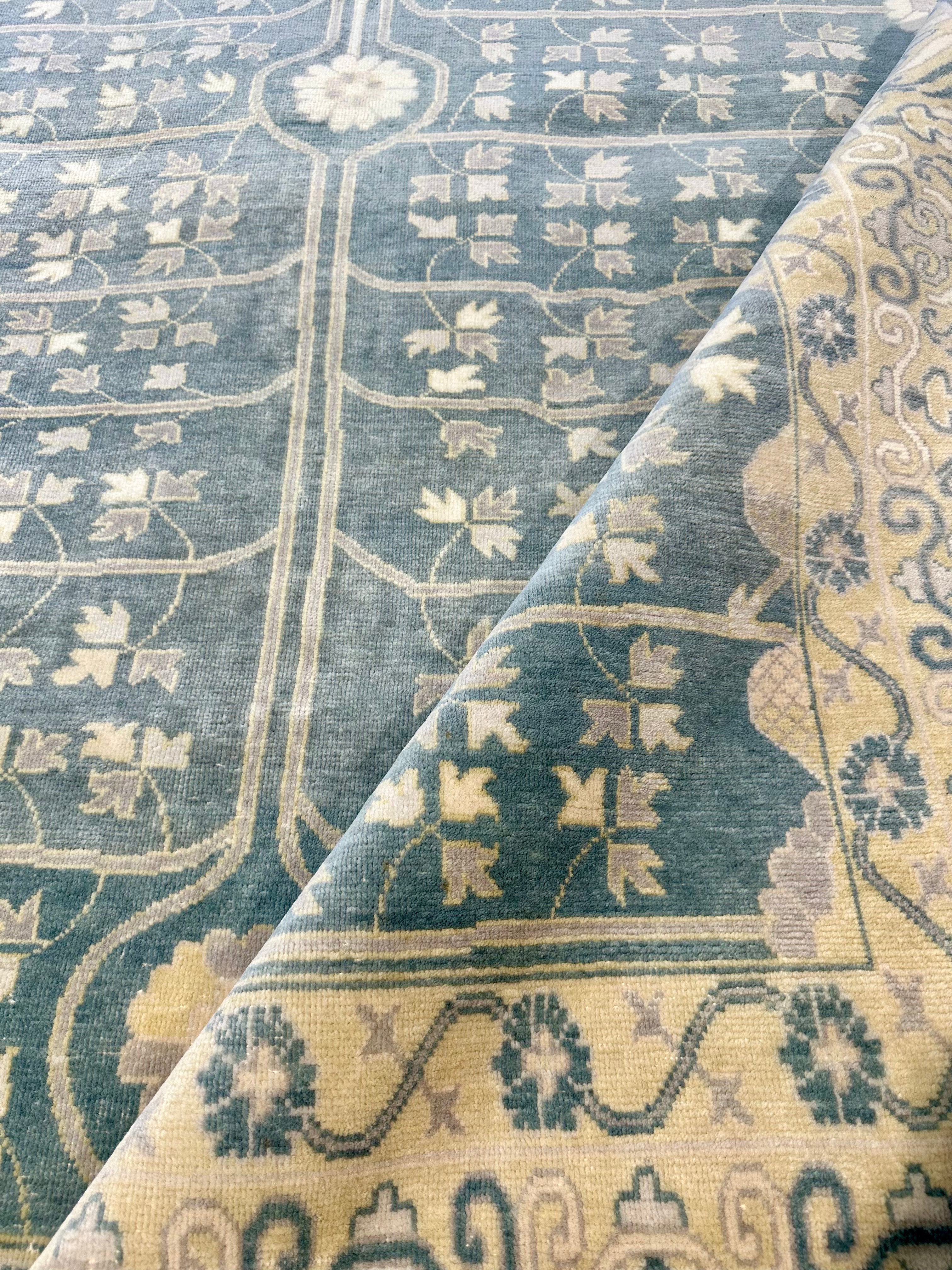 Alecia Johnson 6x9 Blue and Ivory Hand-Knotted Oushak Rug