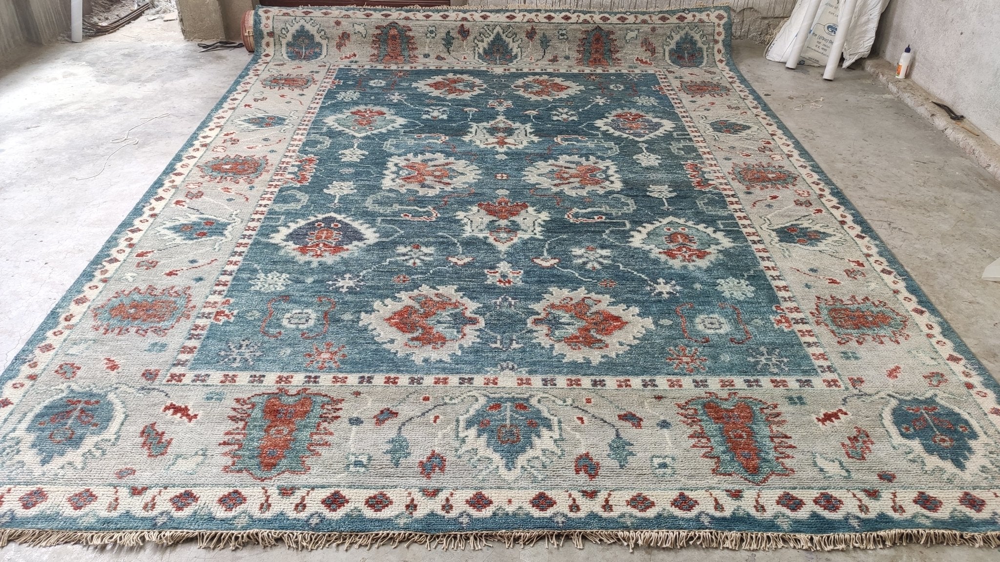 http://bananamanor.com/cdn/shop/products/jolie-9x12-blue-and-tan-hand-knotted-oushak-rug-290214.jpg?v=1683158933