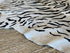 Tiger Print Cowhide Rug | Banana Manor Rug Company