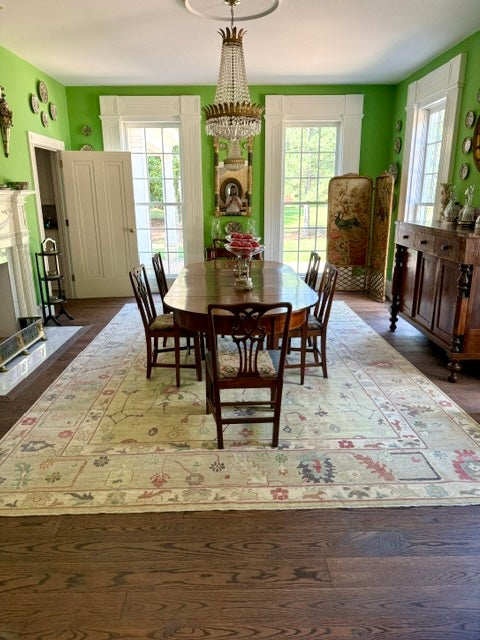 Oushak rug under a dining table