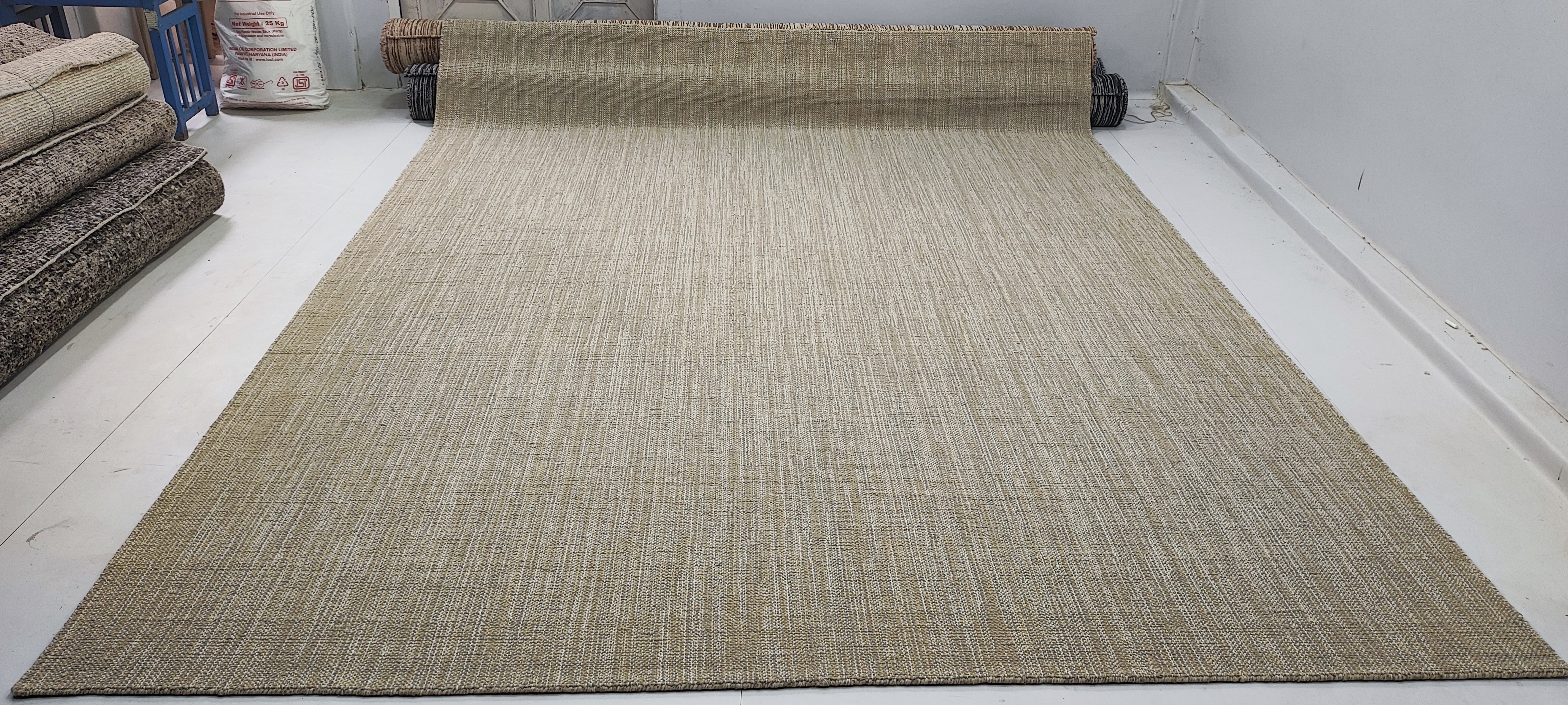 Michael King 9x12 Hand-Woven Durrie Textured Beige