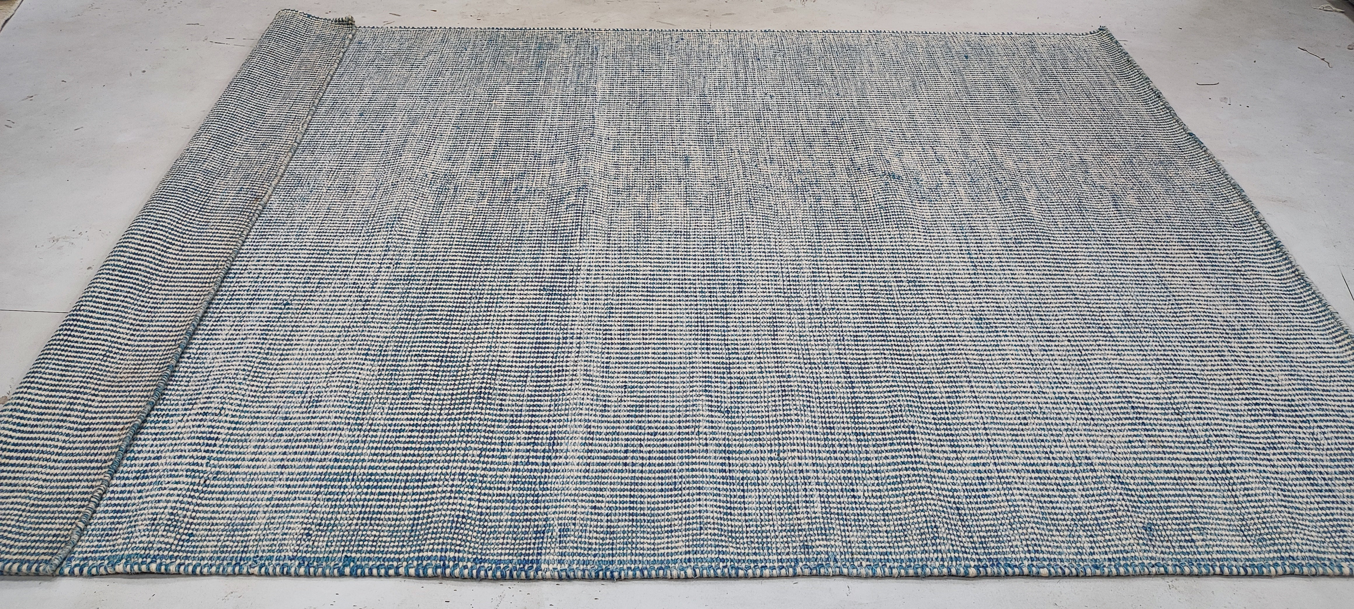 Sarian 5.3x7.6 Hand-Woven Durrie Ivory and Light Blue