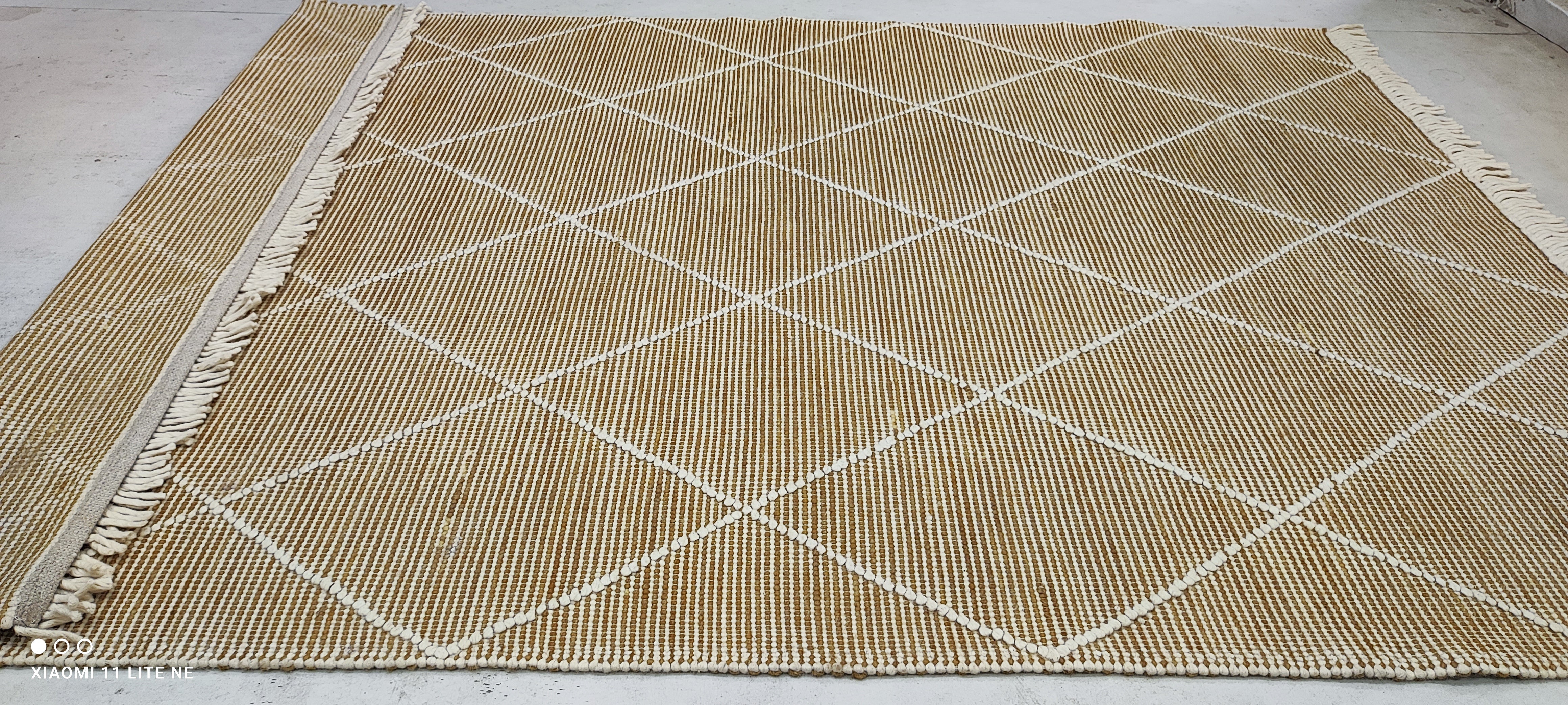 Jacob Rapini 6.9x9.3 Gold Handwoven Modern Rug