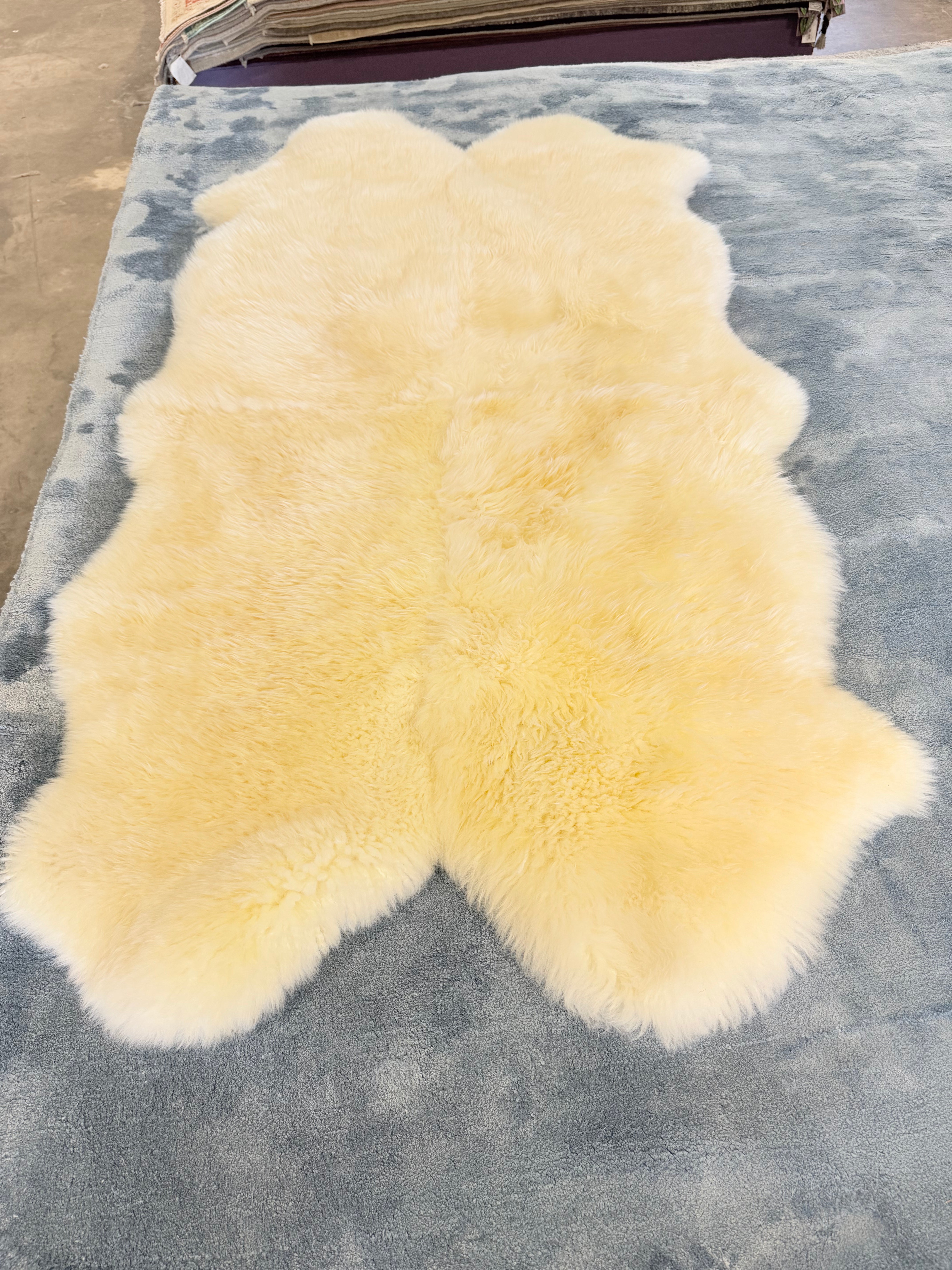 Four Pelt White Sheepskin Rug