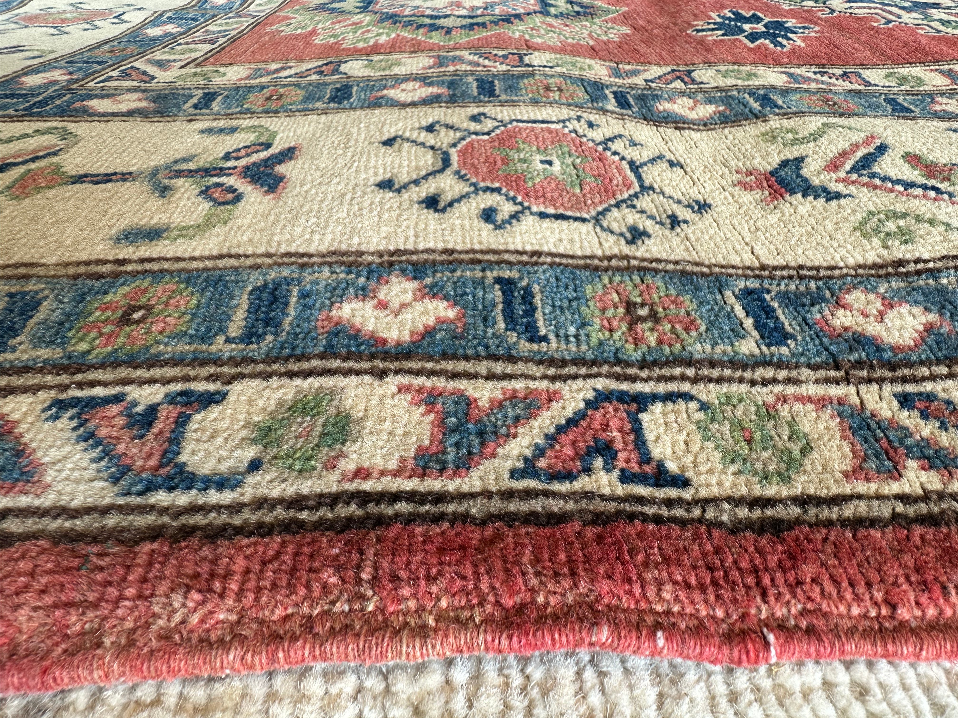 Mallory Hoff 6x8.7 Red Hand-Knotted Kazak Rug