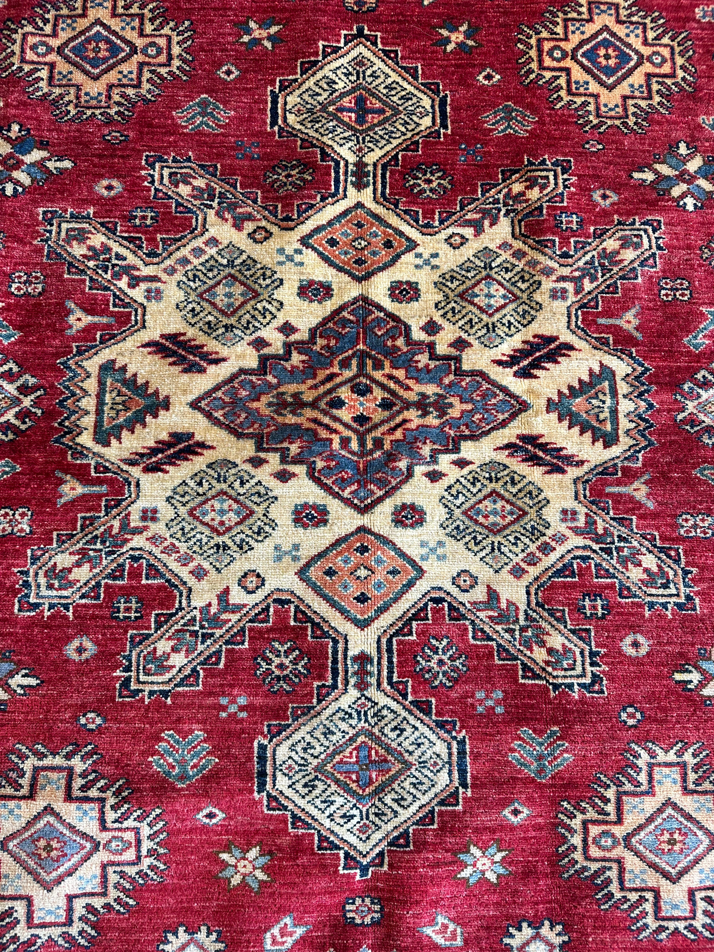 Lisa Yeiser 5.6x7.11 Red Hand-Knotted Kazak Rug