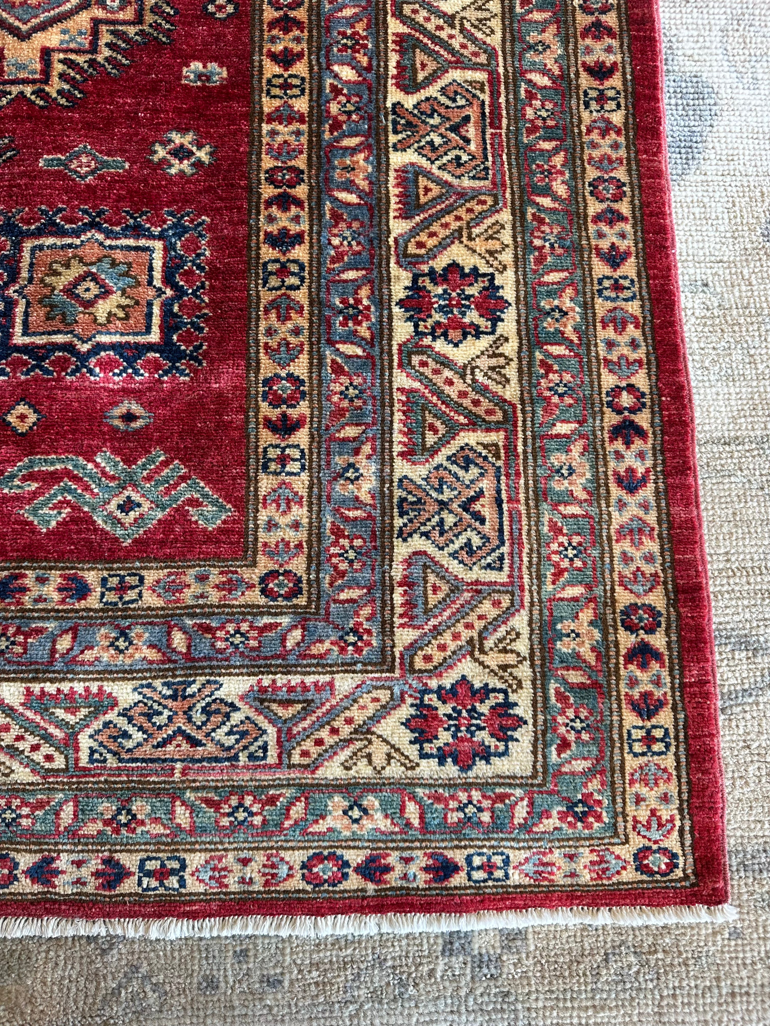 Lisa Yeiser 5.6x7.11 Red Hand-Knotted Kazak Rug
