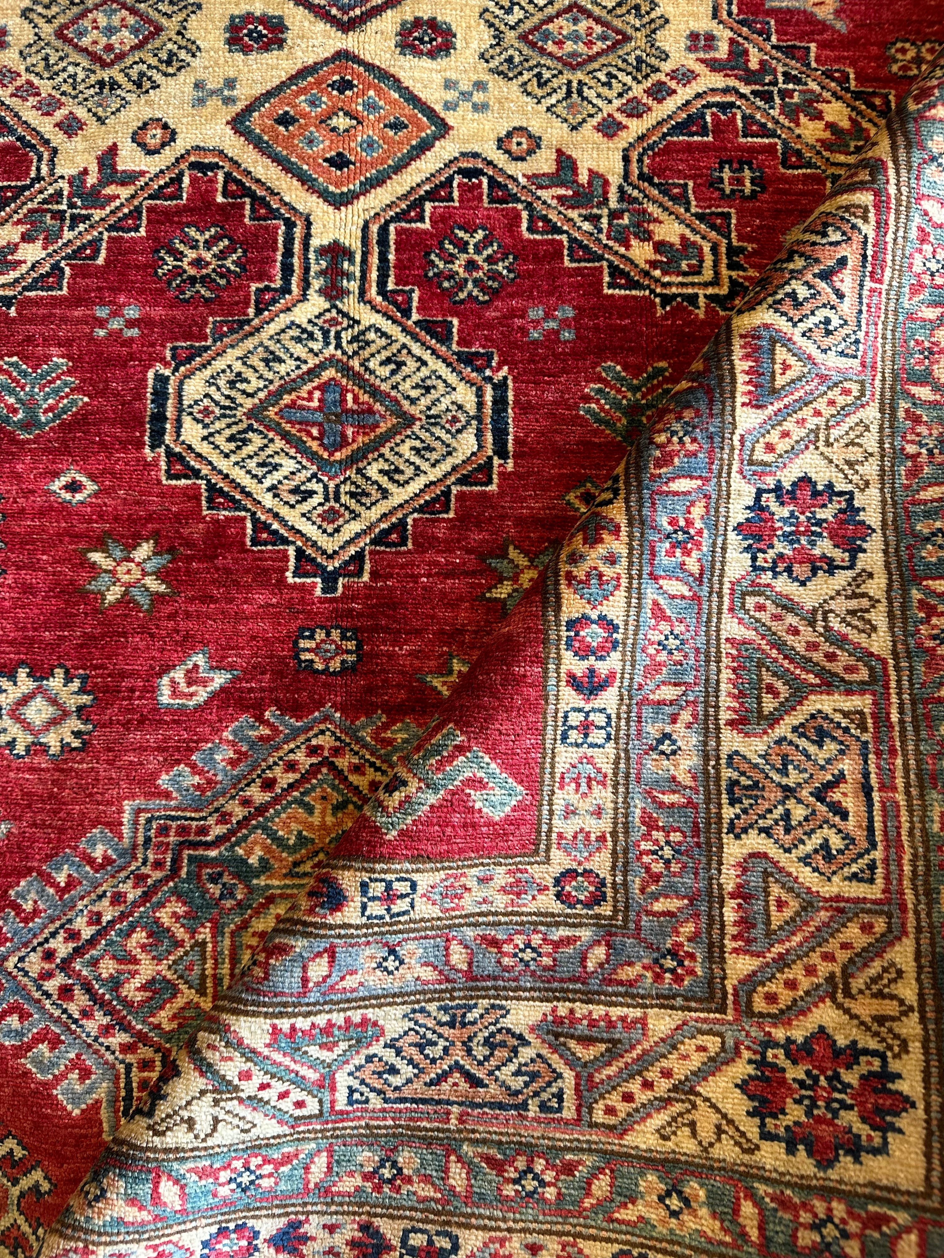 Lisa Yeiser 5.6x7.11 Red Hand-Knotted Kazak Rug