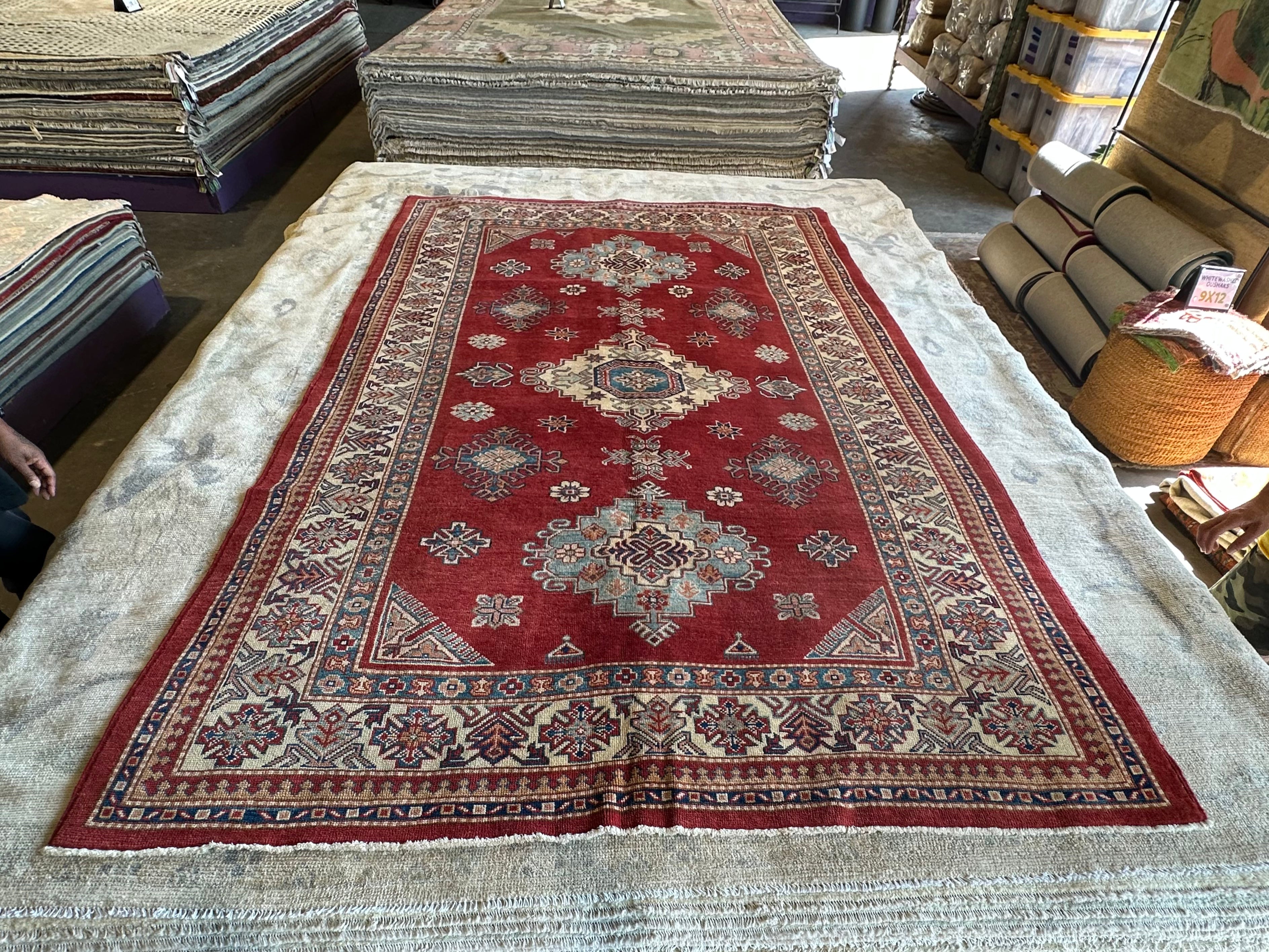 Katie Walsh 6.1x9.3 Red Hand-Knotted Kazak Rug
