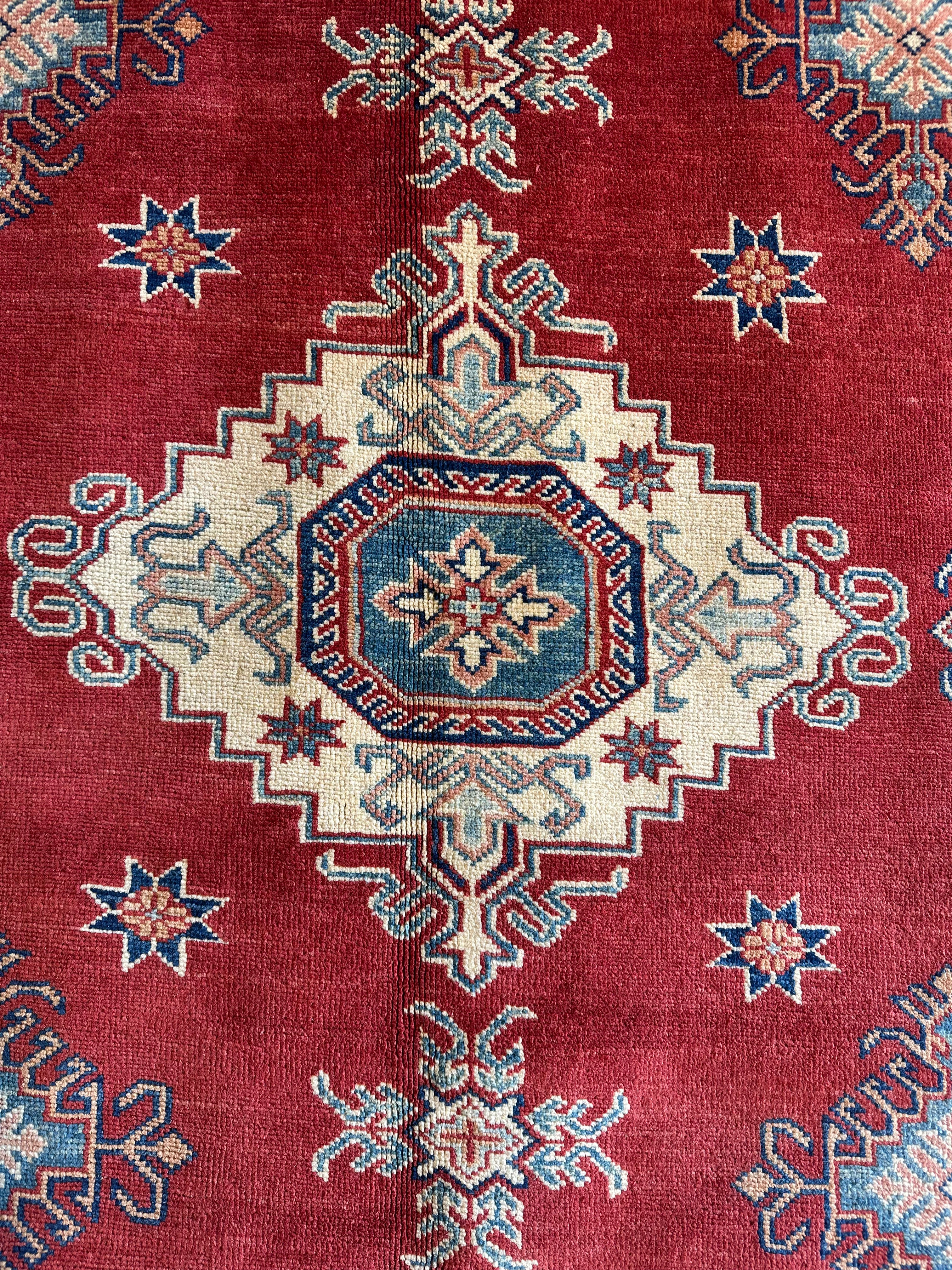 Katie Walsh 6.1x9.3 Red Hand-Knotted Kazak Rug