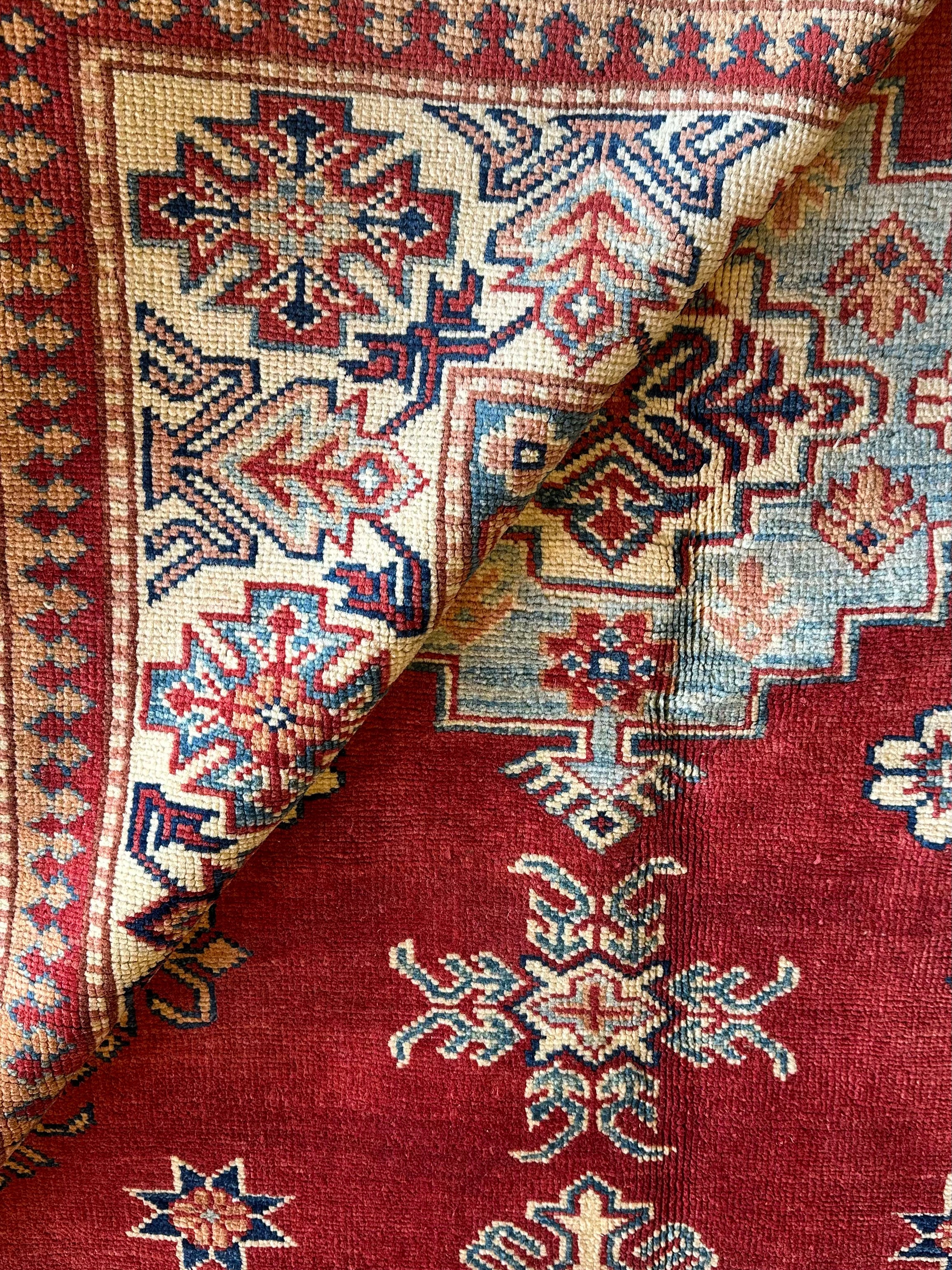 Katie Walsh 6.1x9.3 Red Hand-Knotted Kazak Rug