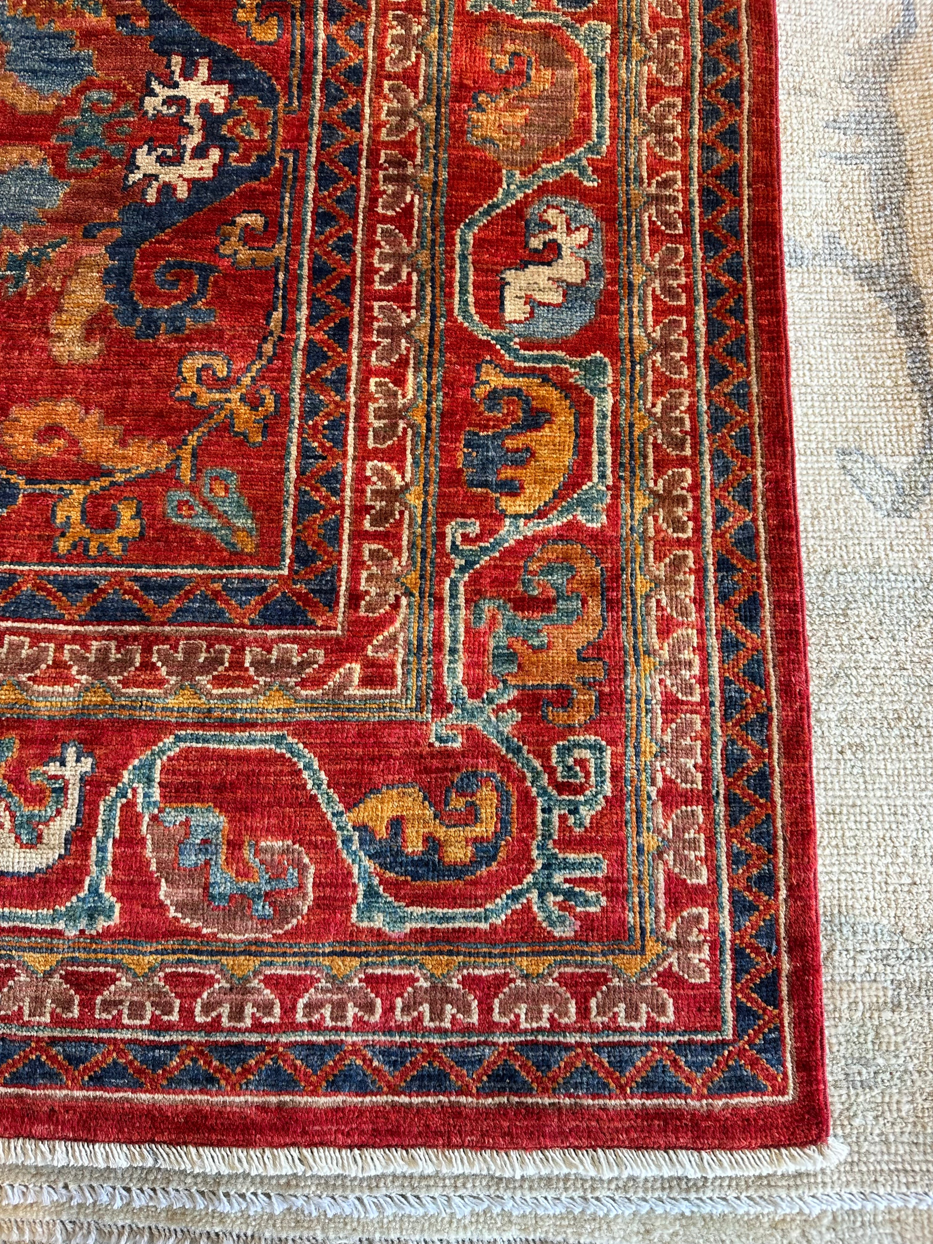 Rachel Bell 5.11x8.10 Red Hand-Knotted Humna Rug