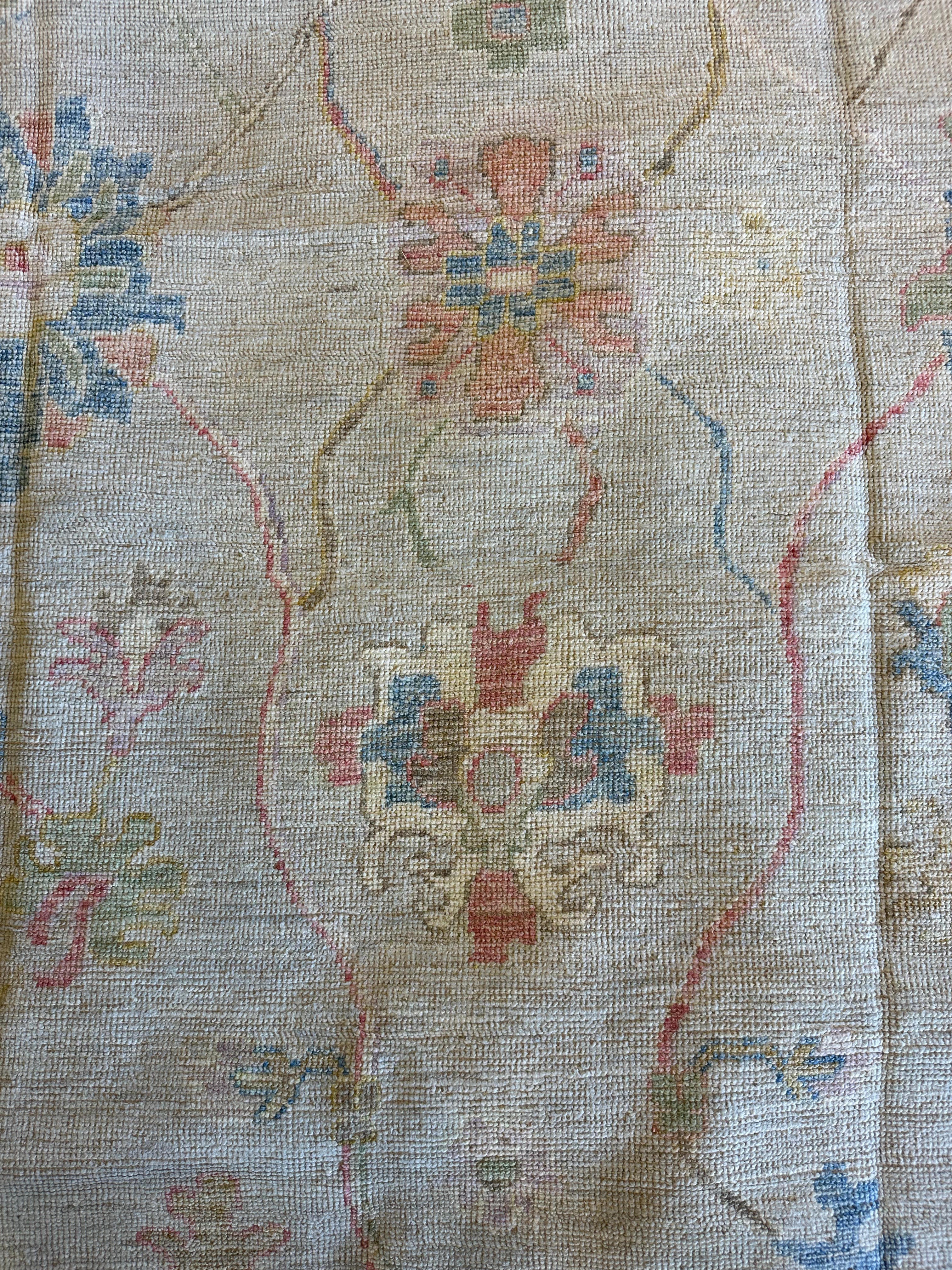Corinne de Berry 8.10x11.7 Light Blue Red Whitewashed Afghani Oushak Rug