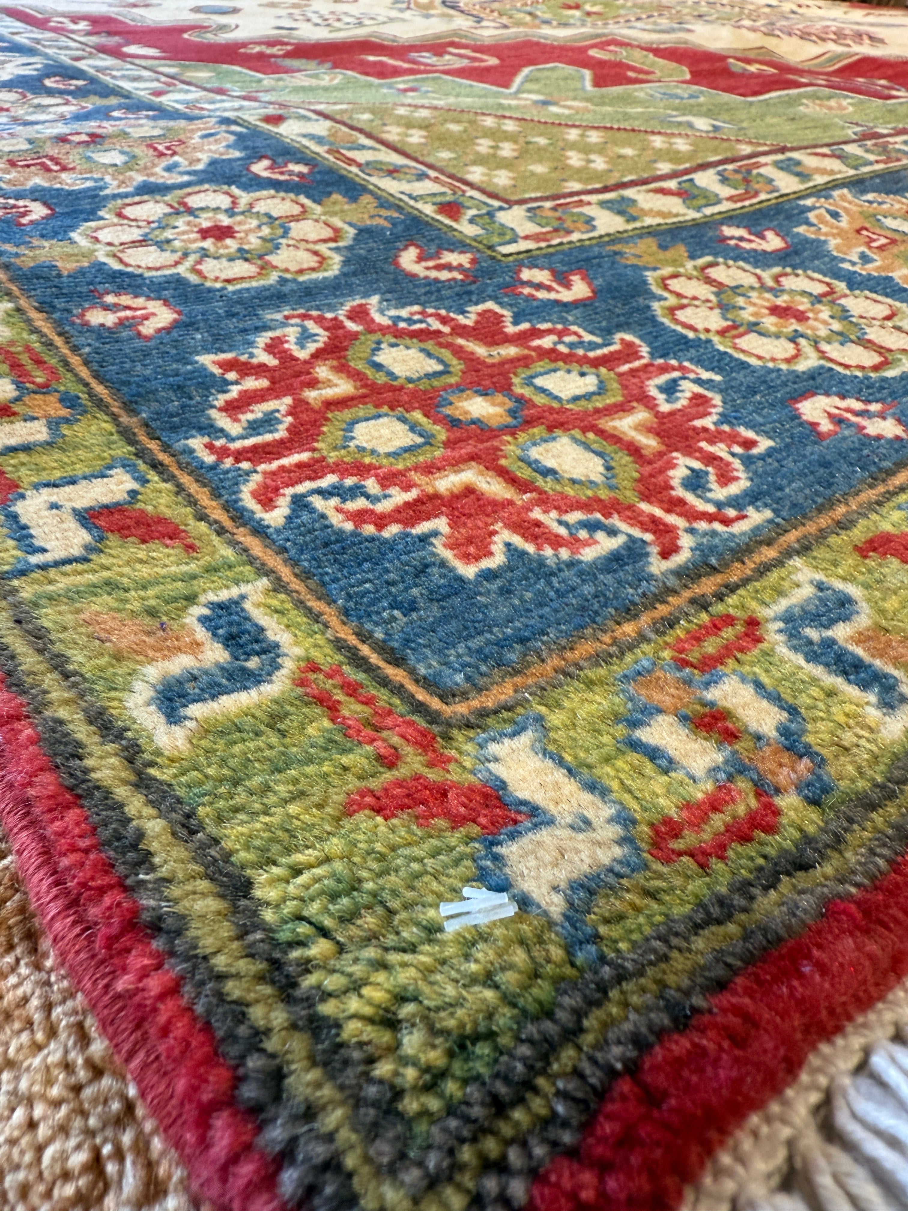 Grace Van Dien 8.1x10.5 Tribal Kazak Red Rug