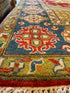 Grace Van Dien 8.1x10.5 Tribal Kazak Red Rug