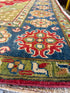 Grace Van Dien 8.1x10.5 Tribal Kazak Red Rug