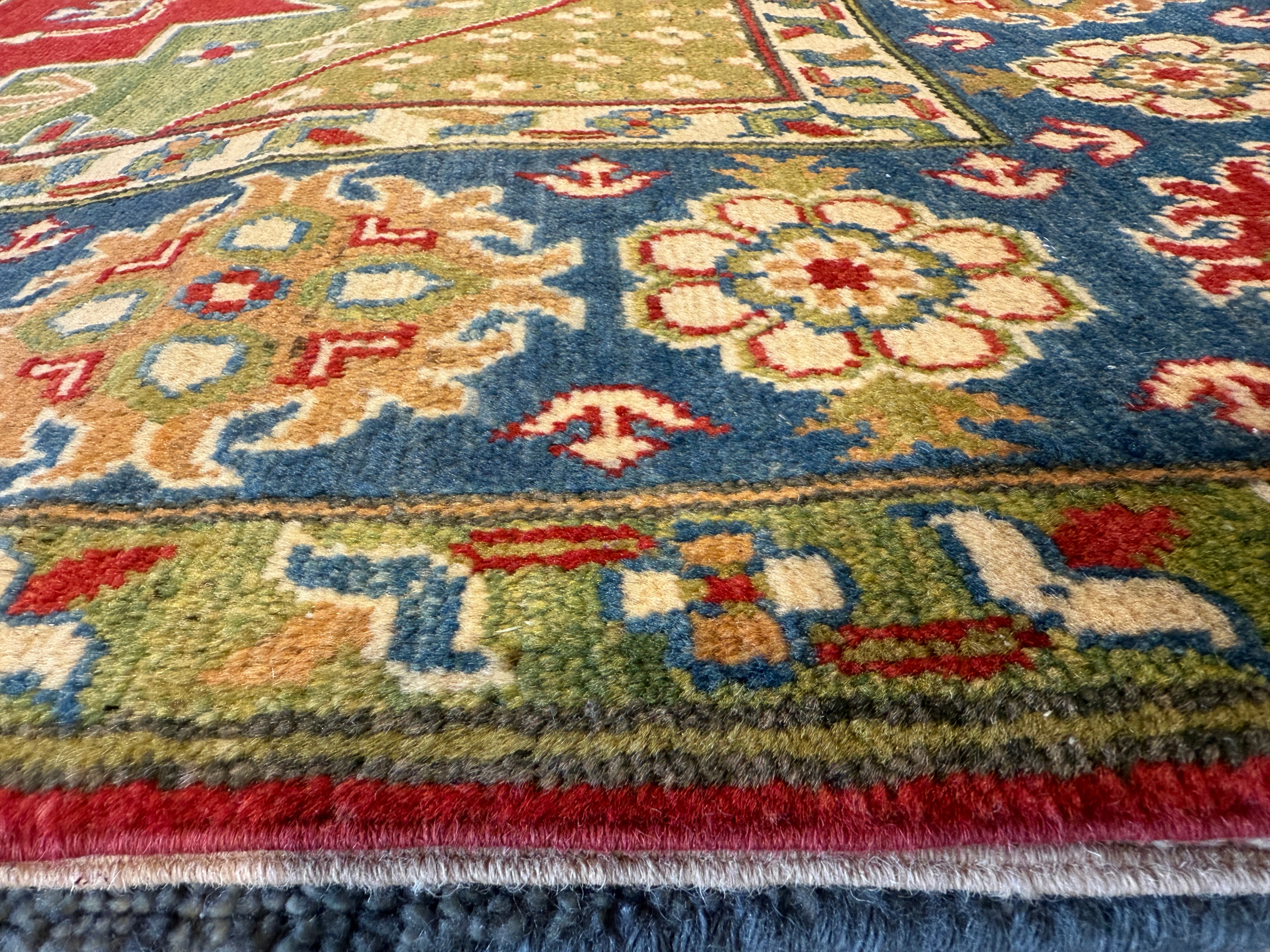 Grace Van Dien 8.1x10.5 Tribal Kazak Red Rug