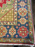 Grace Van Dien 8.1x10.5 Tribal Kazak Red Rug
