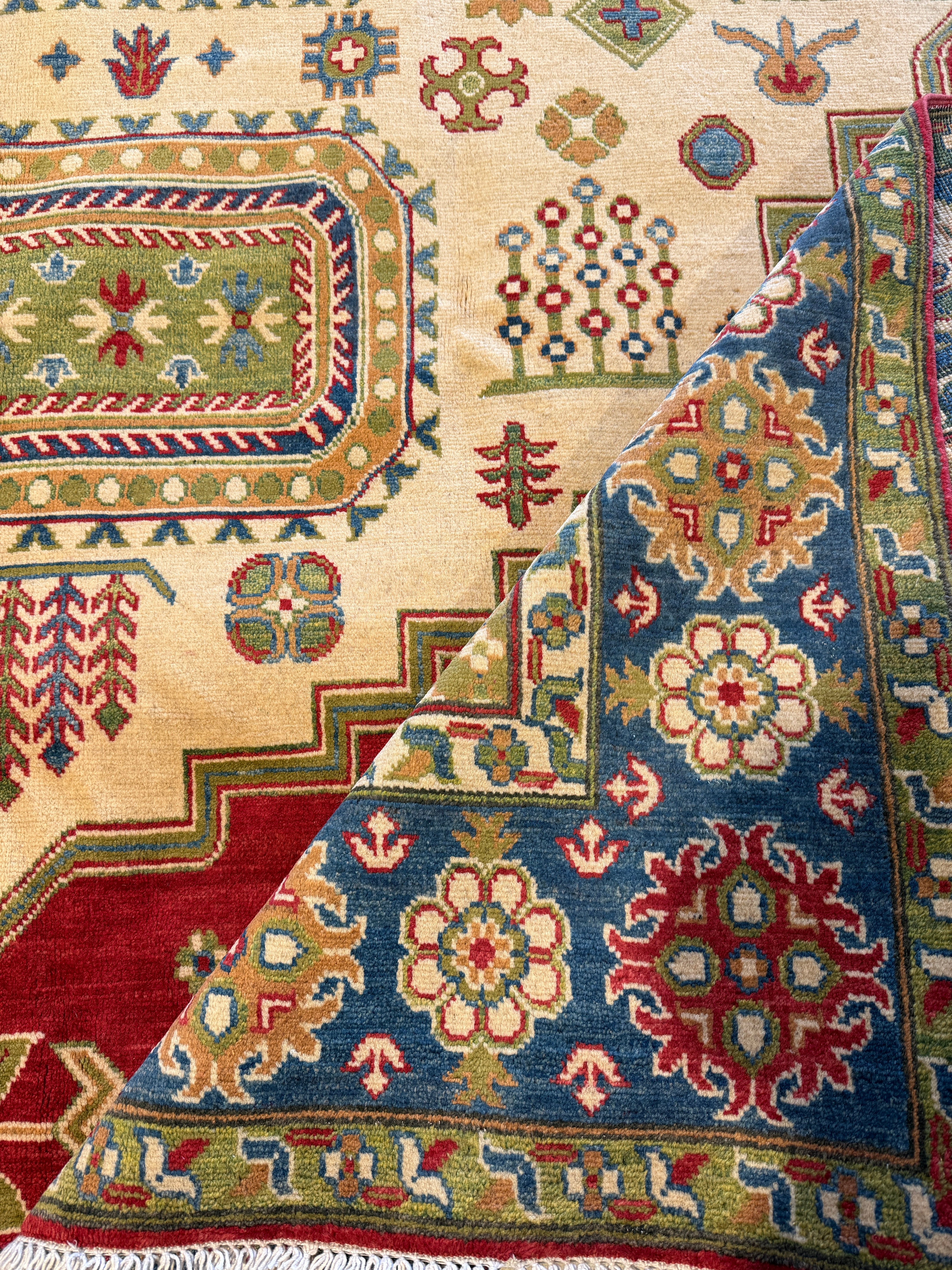 Grace Van Dien 8.1x10.5 Tribal Kazak Red Rug