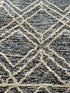 Amelia 5.3x8.0 Hand-Tufted Wool Black & Ivory Loop