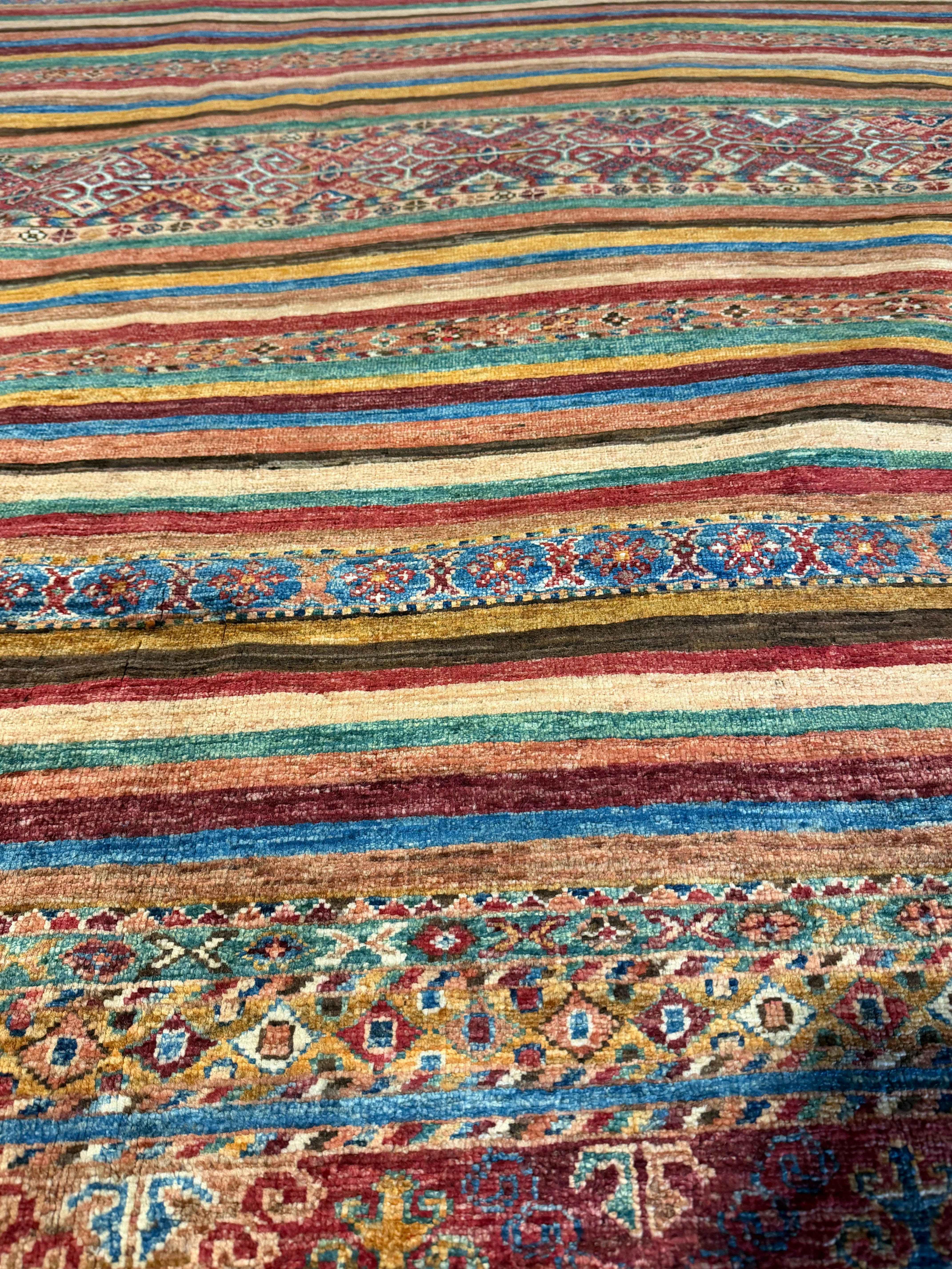 Kelly Carmichael 6.9x9.3 Orange Afghani Khorjin Rug