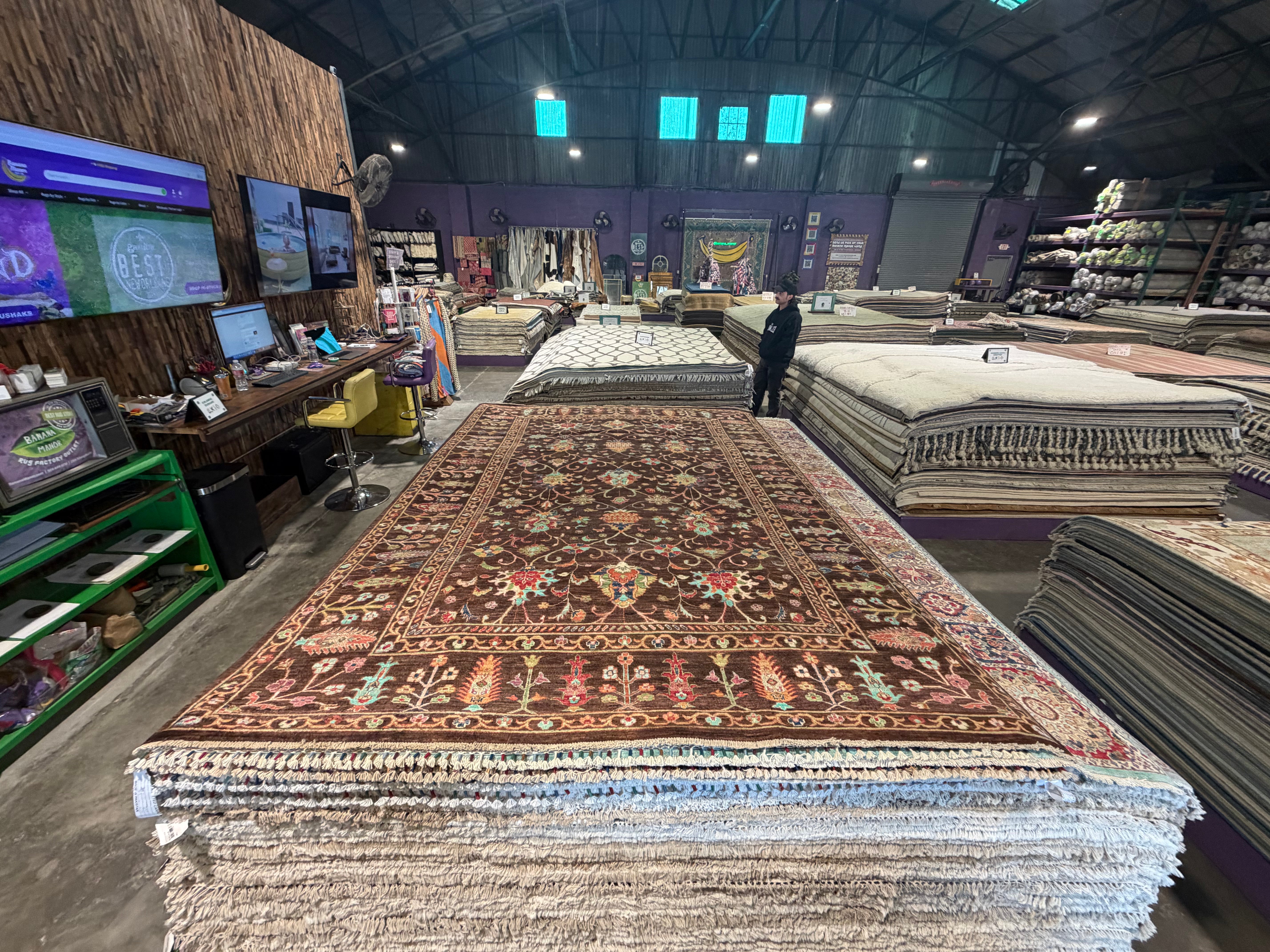 Mary Ann Hagan 6.11x9.8 Brown Afghani Sultani Rug