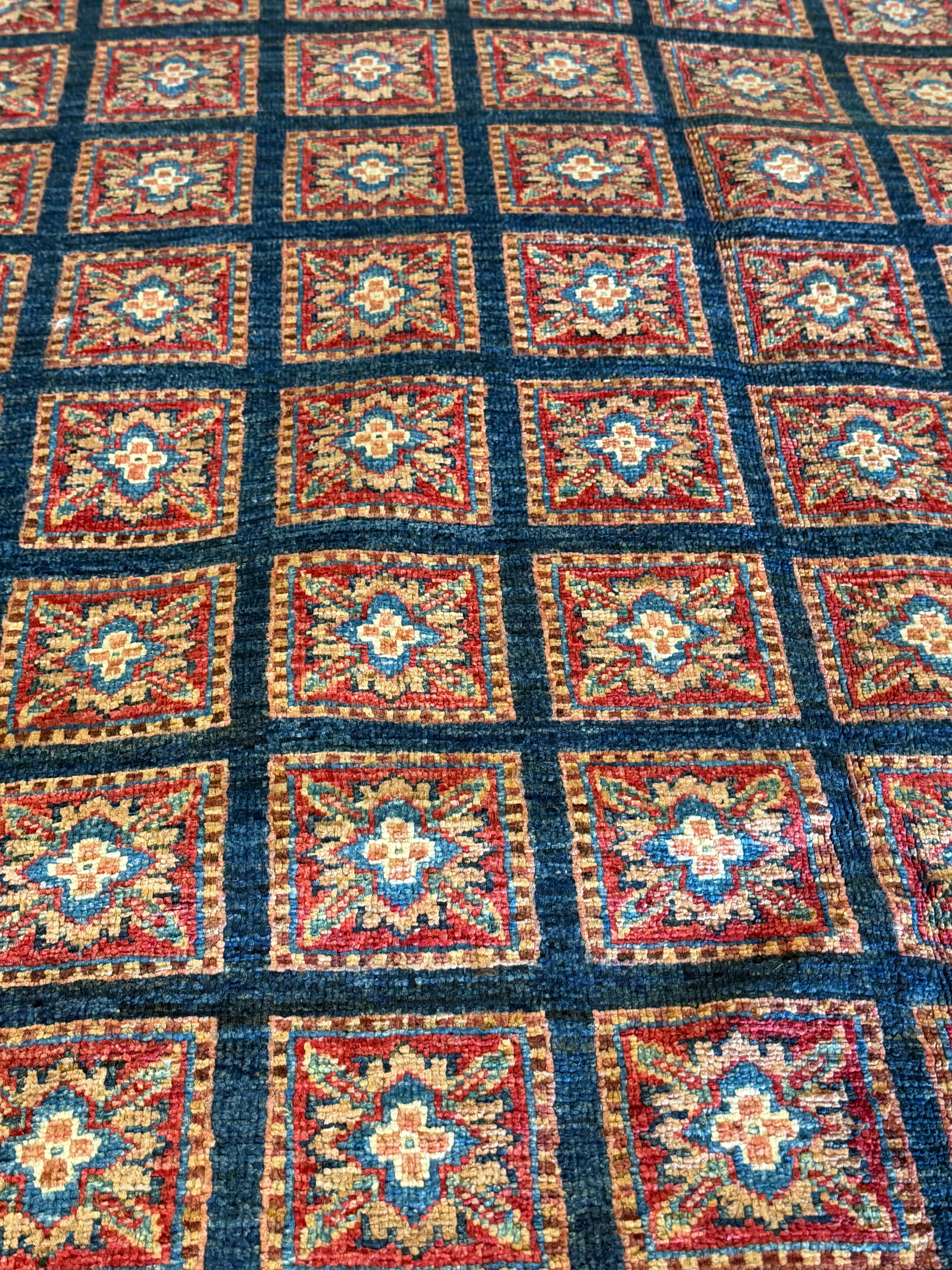 Nina Ali 6.4x9.8 Red Afghani Animal Rug