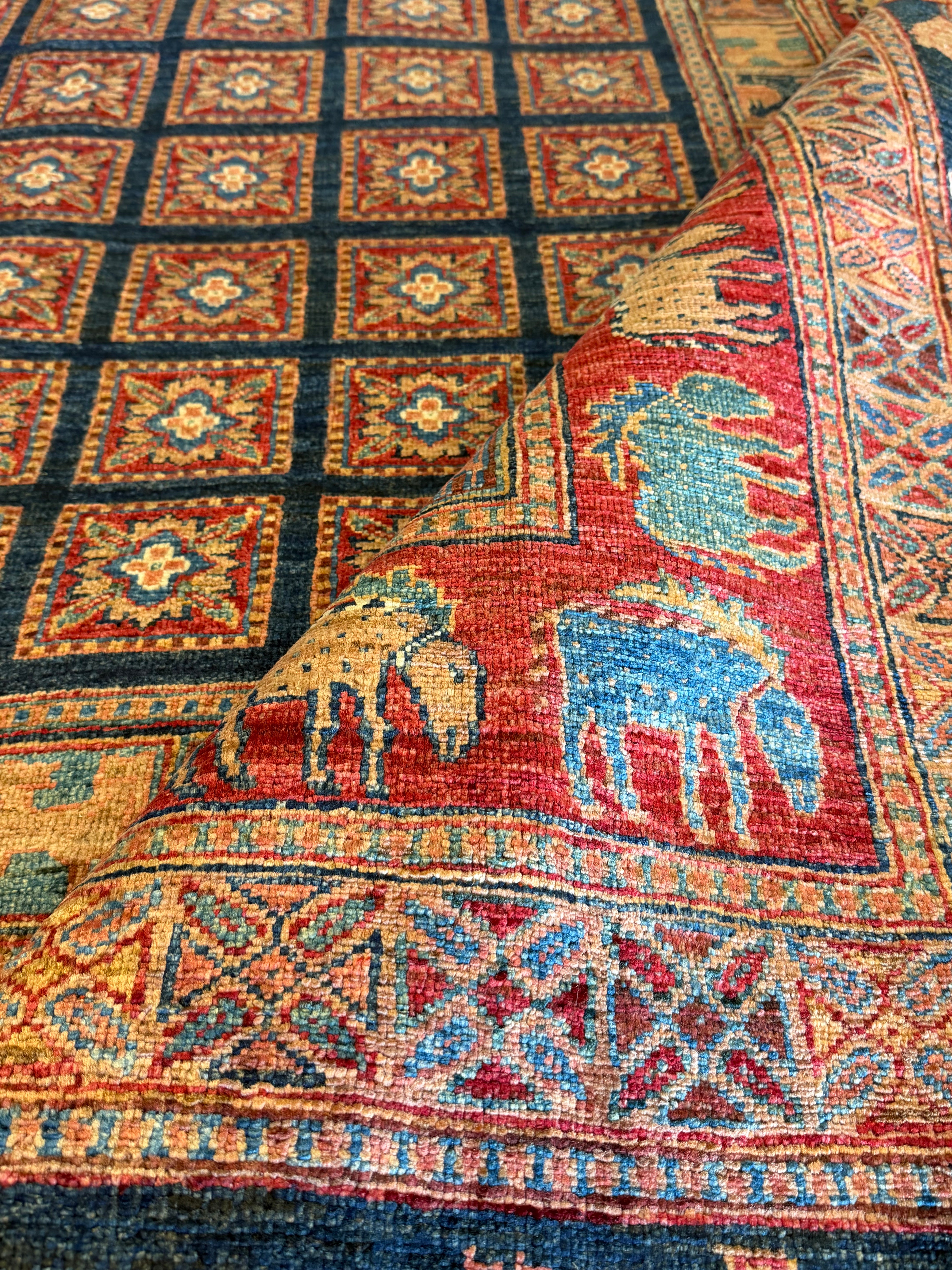 Nina Ali 6.4x9.8 Red Afghani Animal Rug