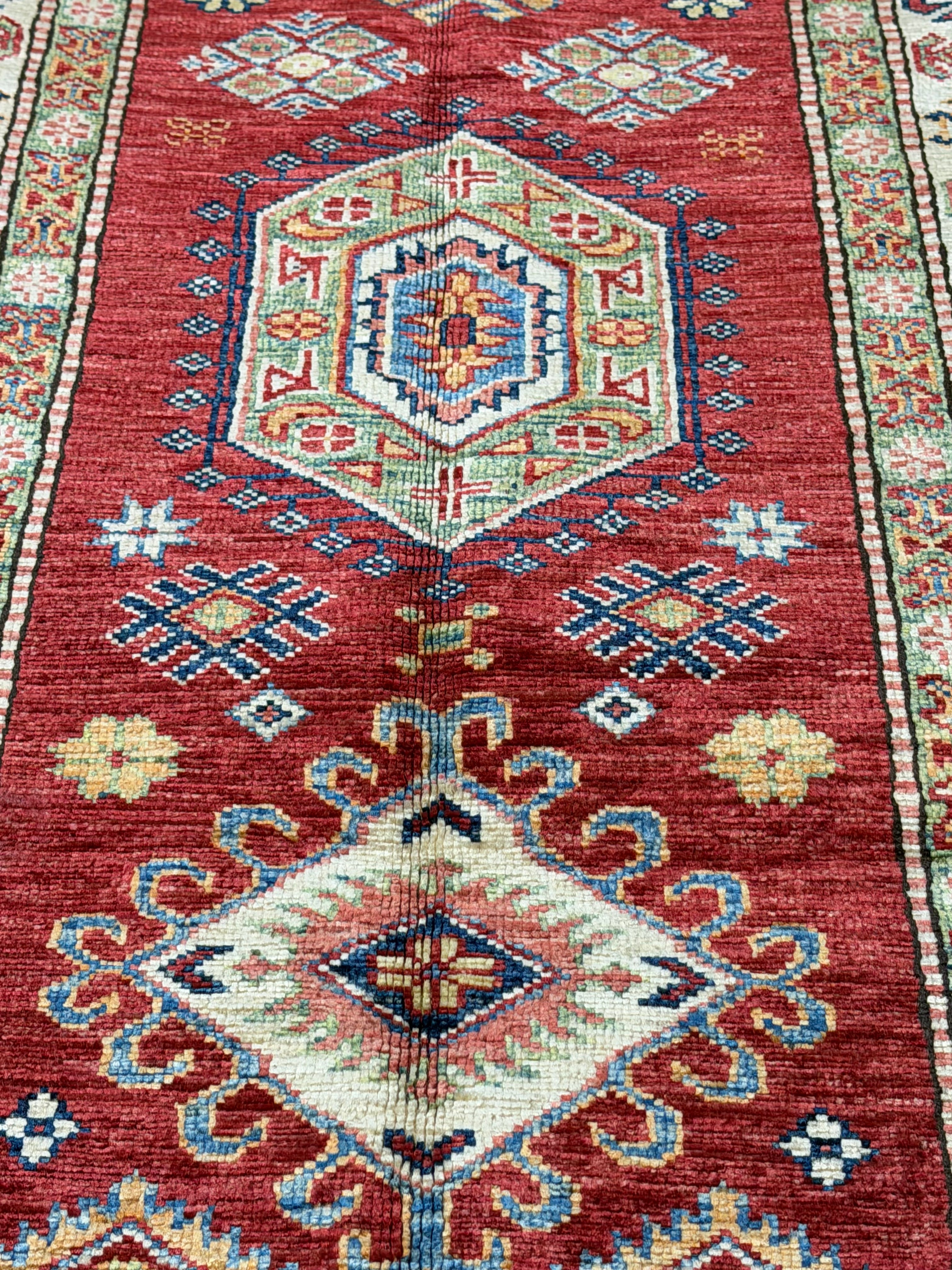 Alice Feeney 2.6x10.4 Red Afghani Khorjin Rug