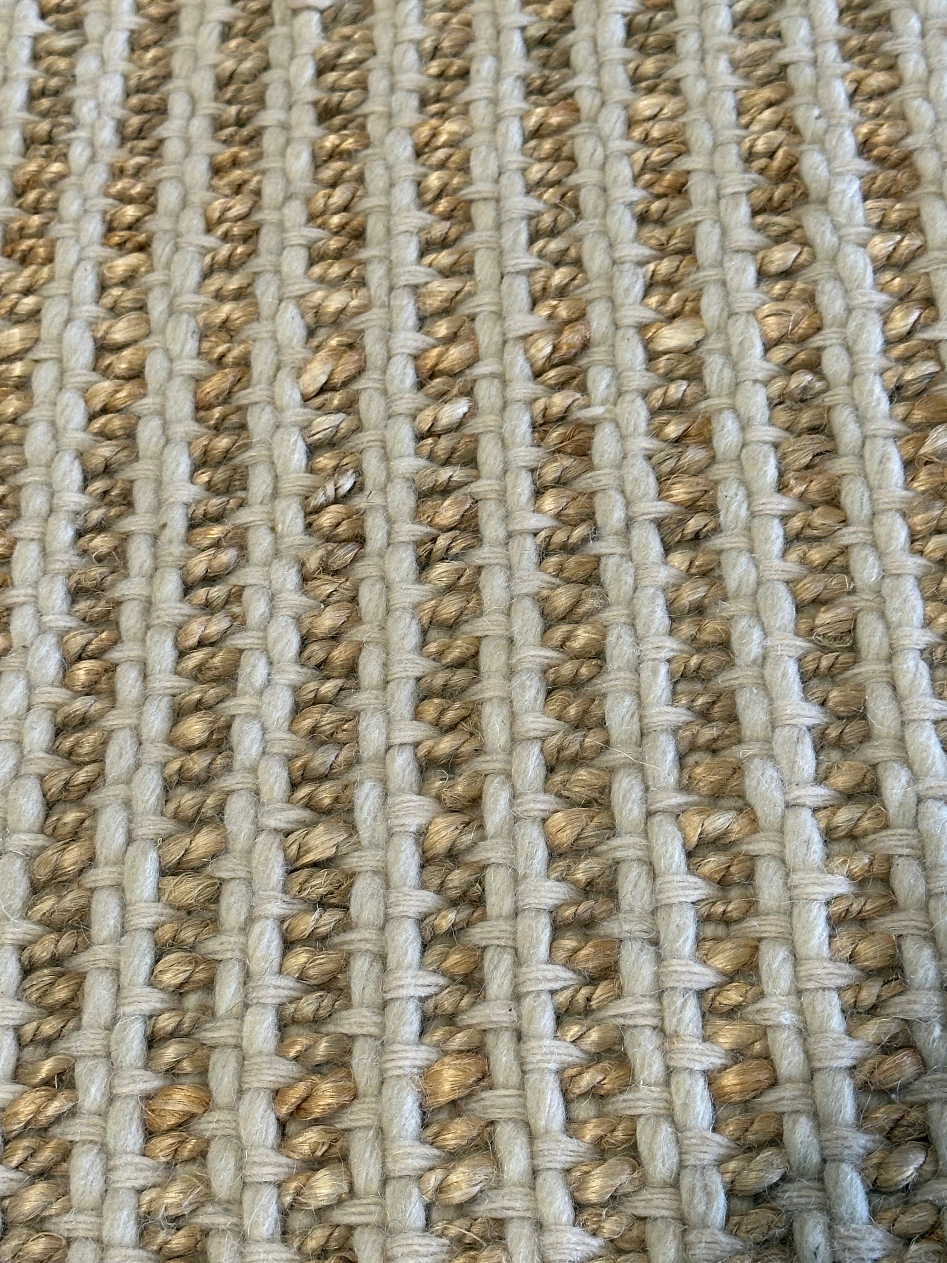 Uzoma Nwachukwu 9.3x12 Cream Handwoven Modern Rug