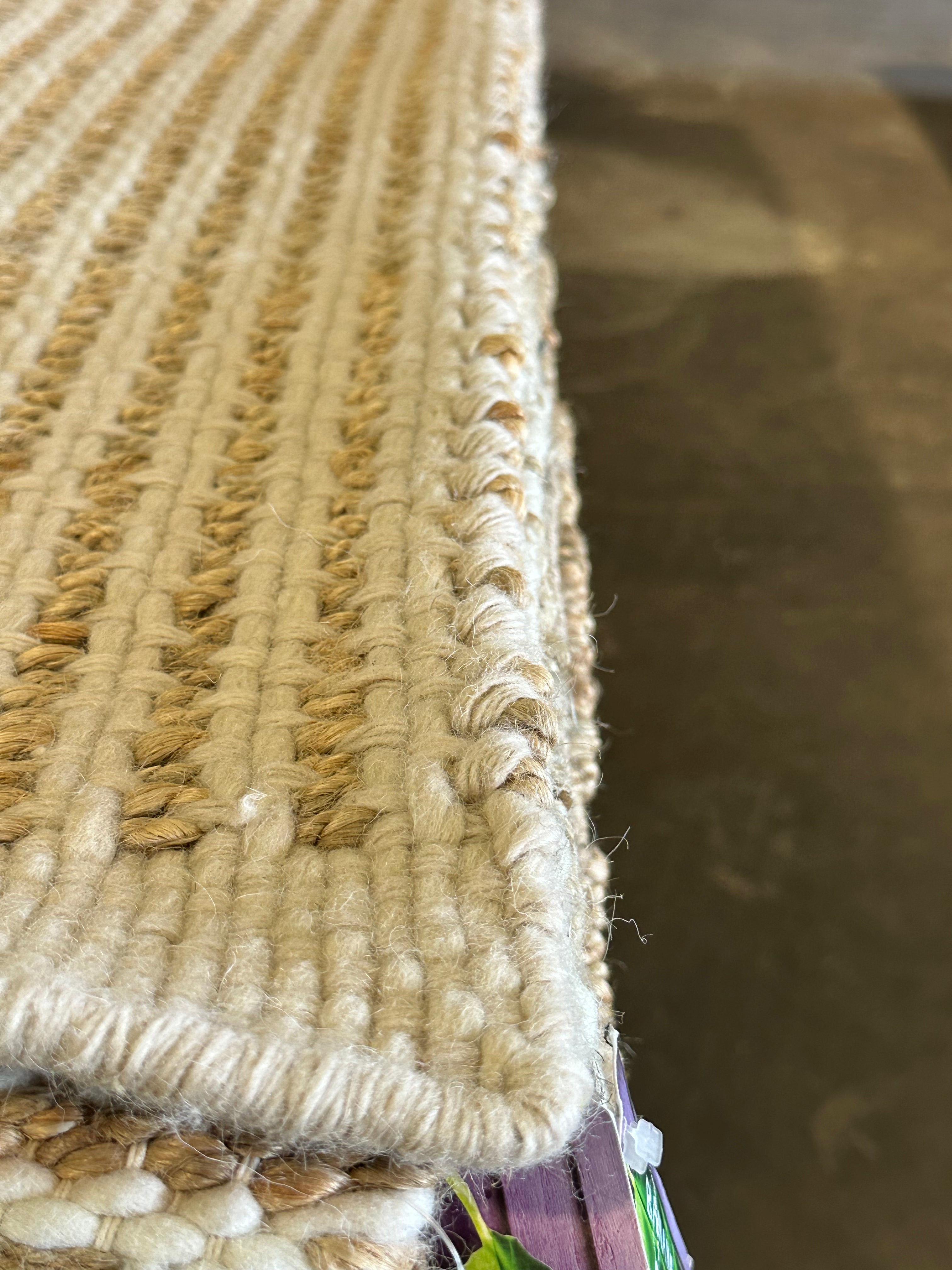Uzoma Nwachukwu 9.3x12 Cream Handwoven Modern Rug