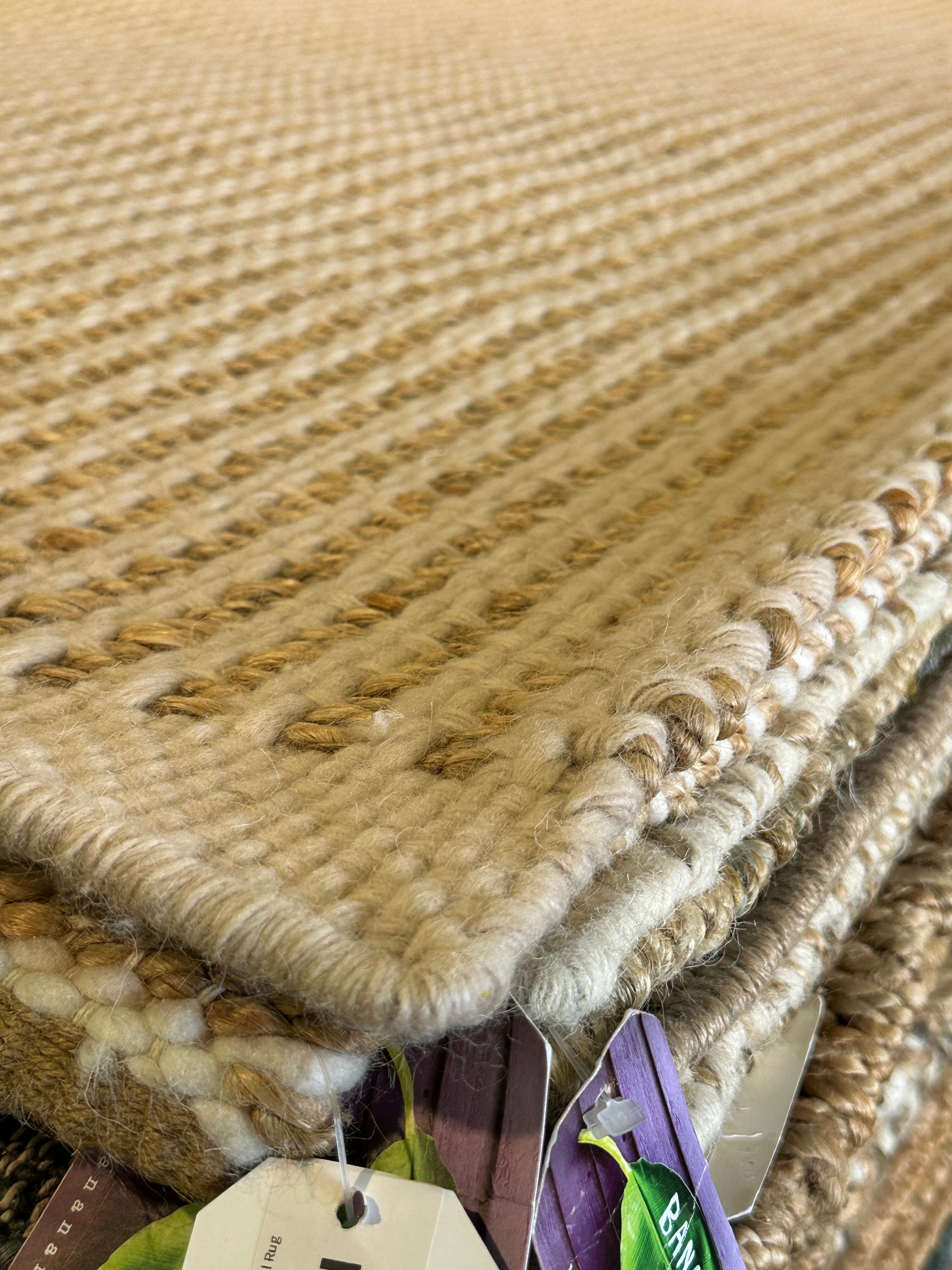 Uzoma Nwachukwu 9.3x12 Cream Handwoven Modern Rug