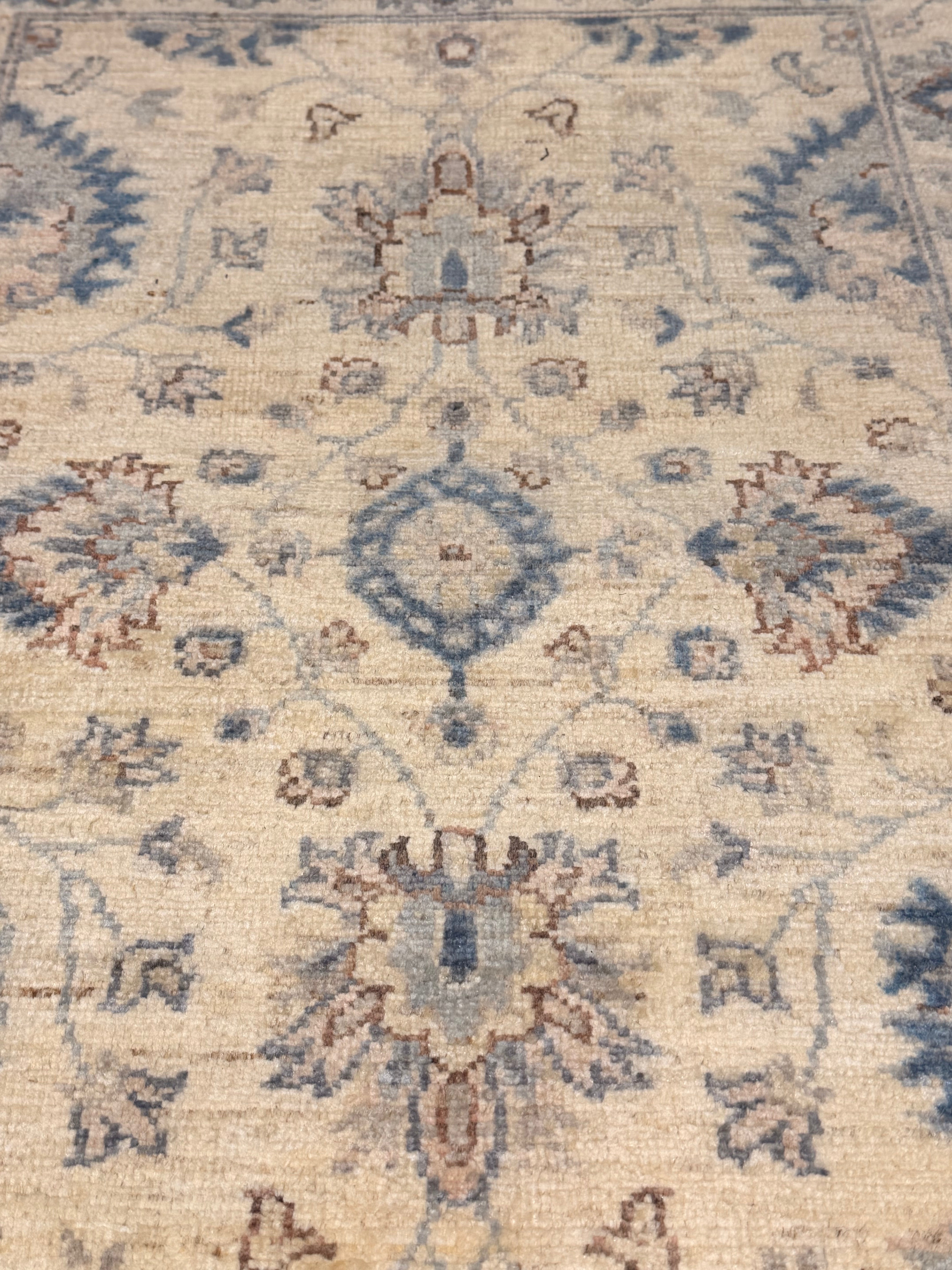 Tessa Thompson 2.1x3 Cream and Blue Afghani Heriz Rug