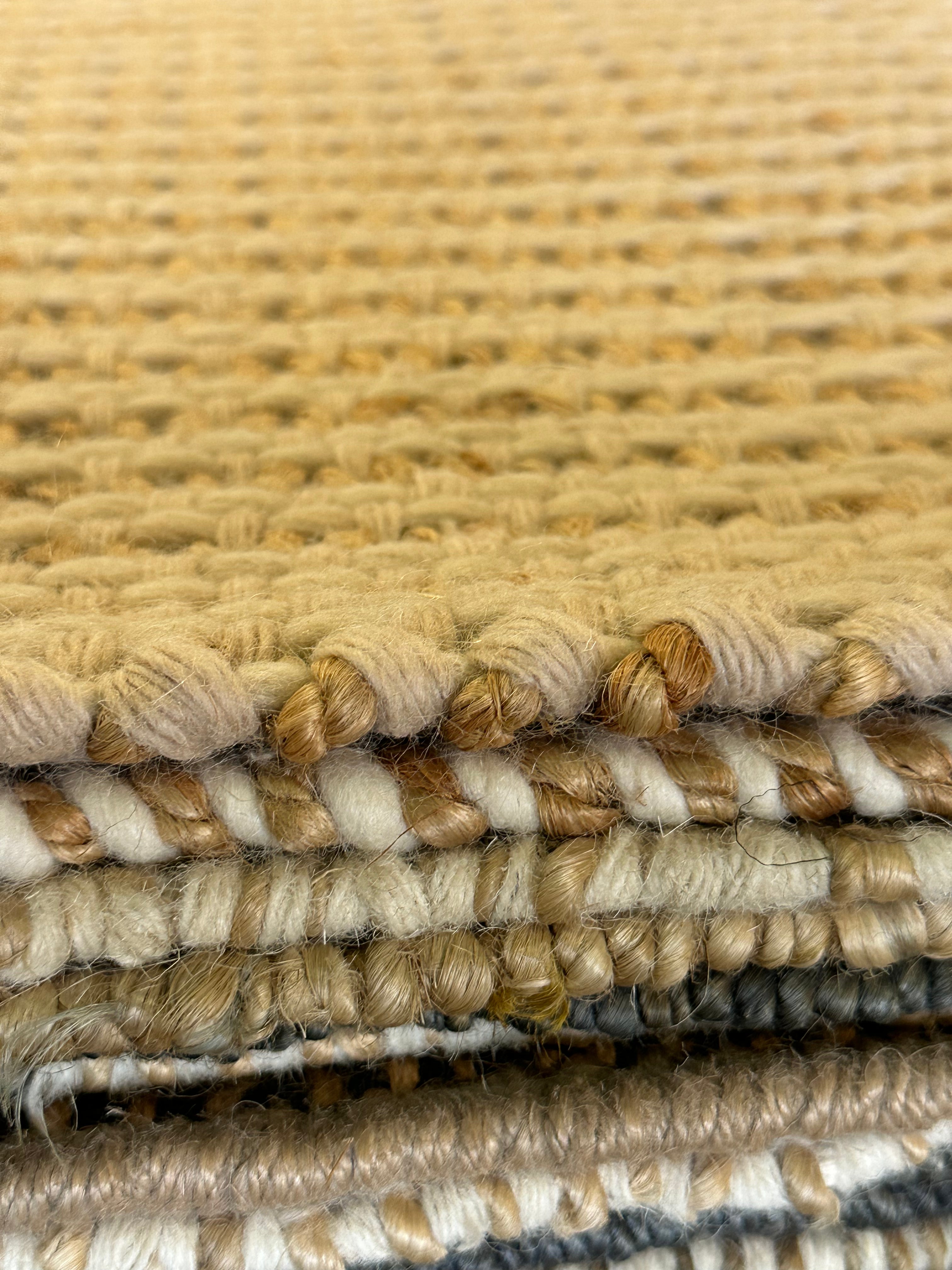 Uzoma Nwachukwu 9.3x12 Cream Handwoven Modern Rug
