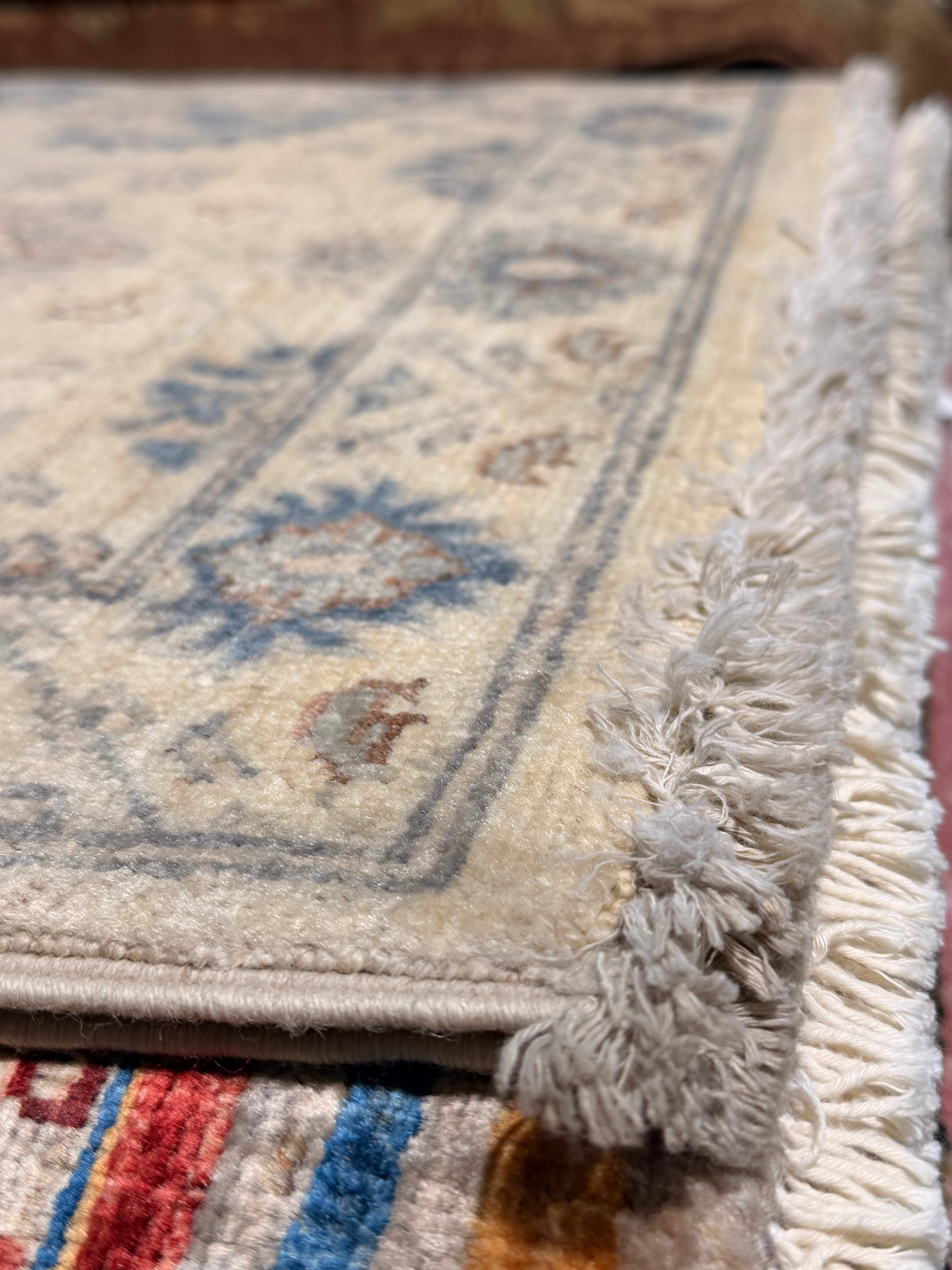 Tessa Thompson 2.1x3 Cream and Blue Afghani Heriz Rug