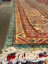 Theresa Thompson 7.11x10.2 Red and Green Afghani Kazak Rug