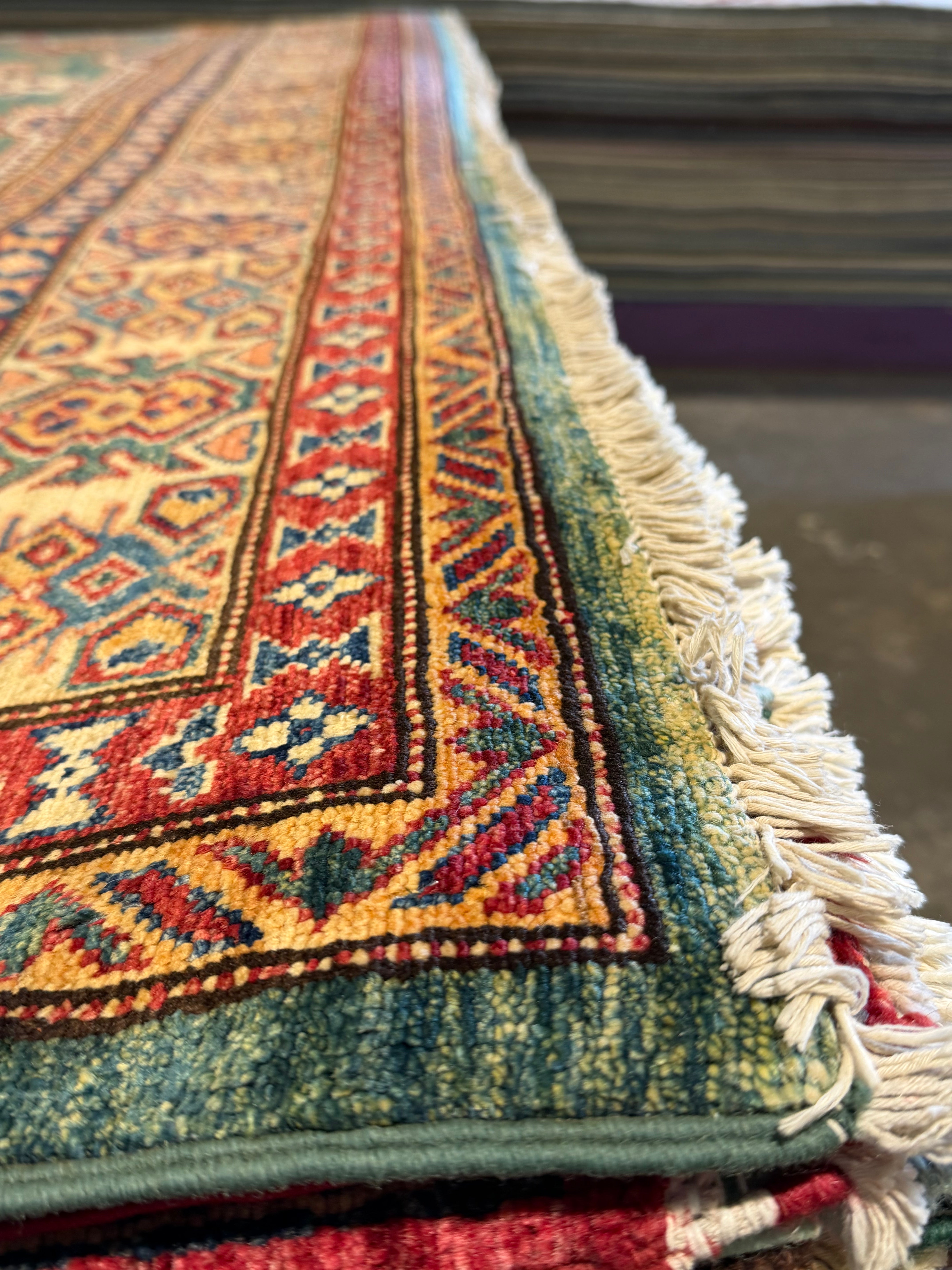 Theresa Thompson 7.11x10.2 Red and Green Afghani Kazak Rug