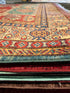 Theresa Thompson 7.11x10.2 Red and Green Afghani Kazak Rug