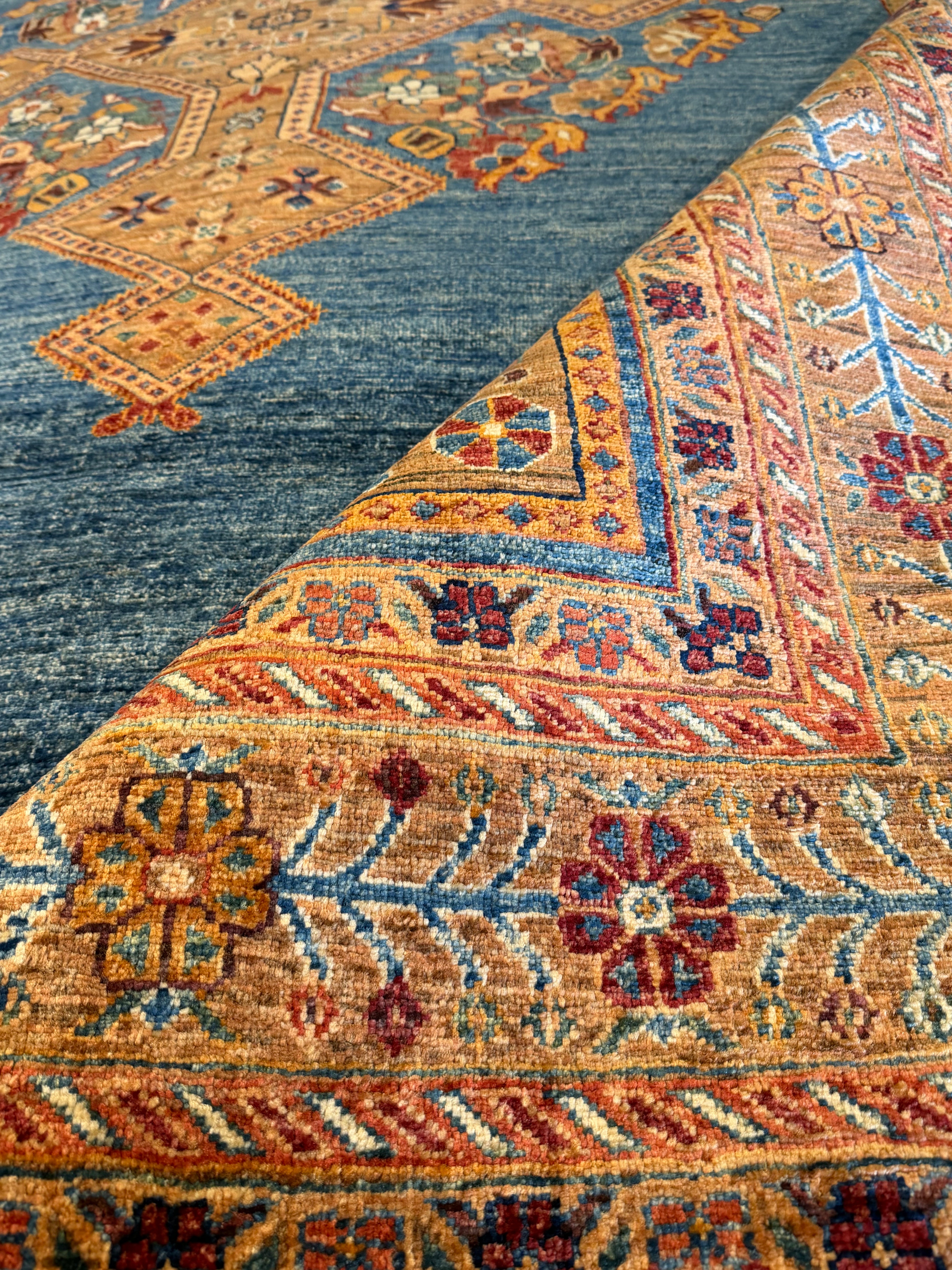 Cary Deuber 6.9x9.8 Orange and Blue Afghani Mamluk Rug