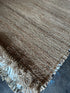 Miss Stein Natural Handwoven Jute Rug (Multiple Sizes)