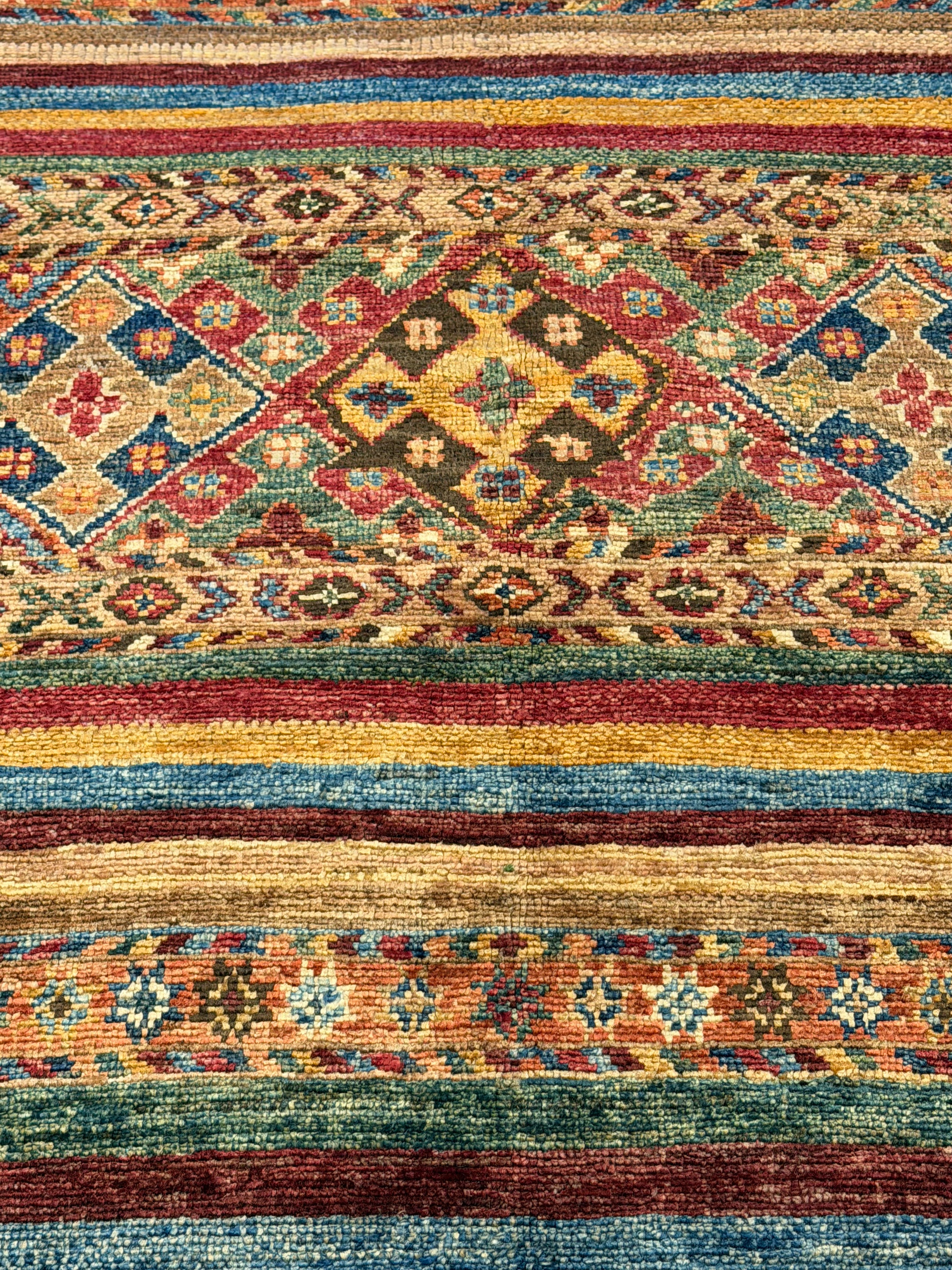 Tiffany Hendra 5.9x8.4 Orange Afghani Khorjin Rug
