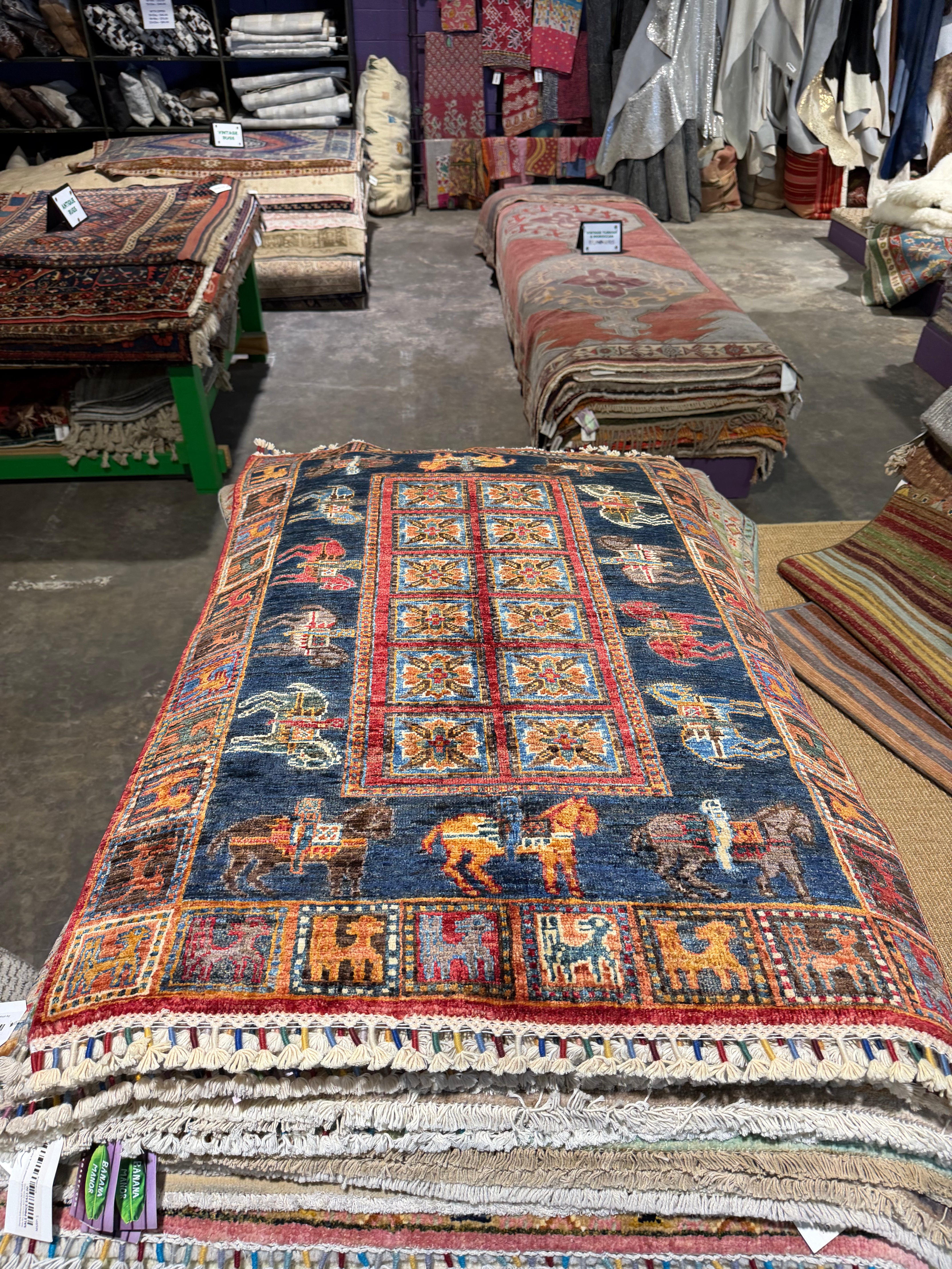 Kristen Maxwell 2.11x4.2 Red Afghani Animal Rug