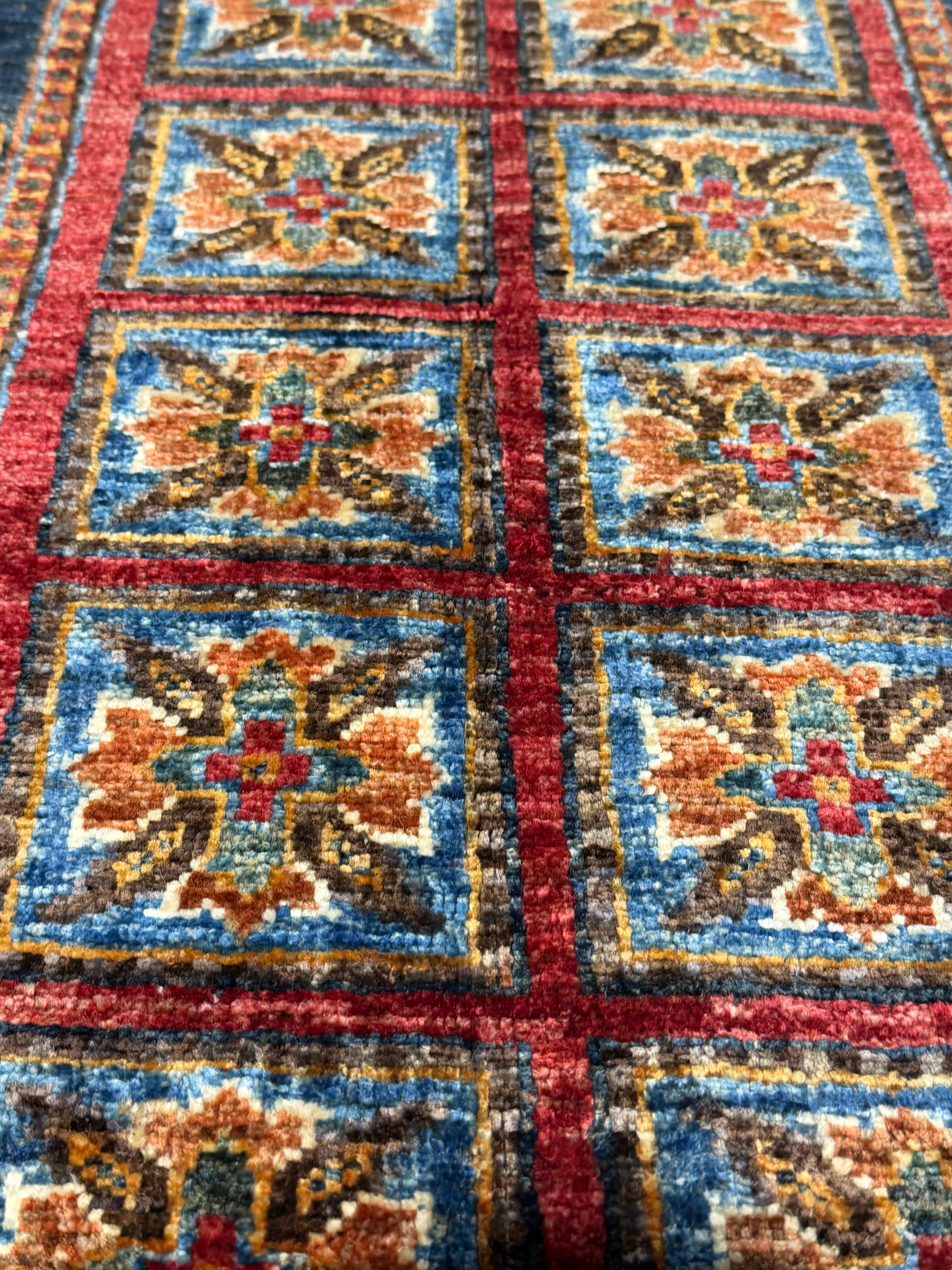 Kristen Maxwell 2.11x4.2 Red Afghani Animal Rug