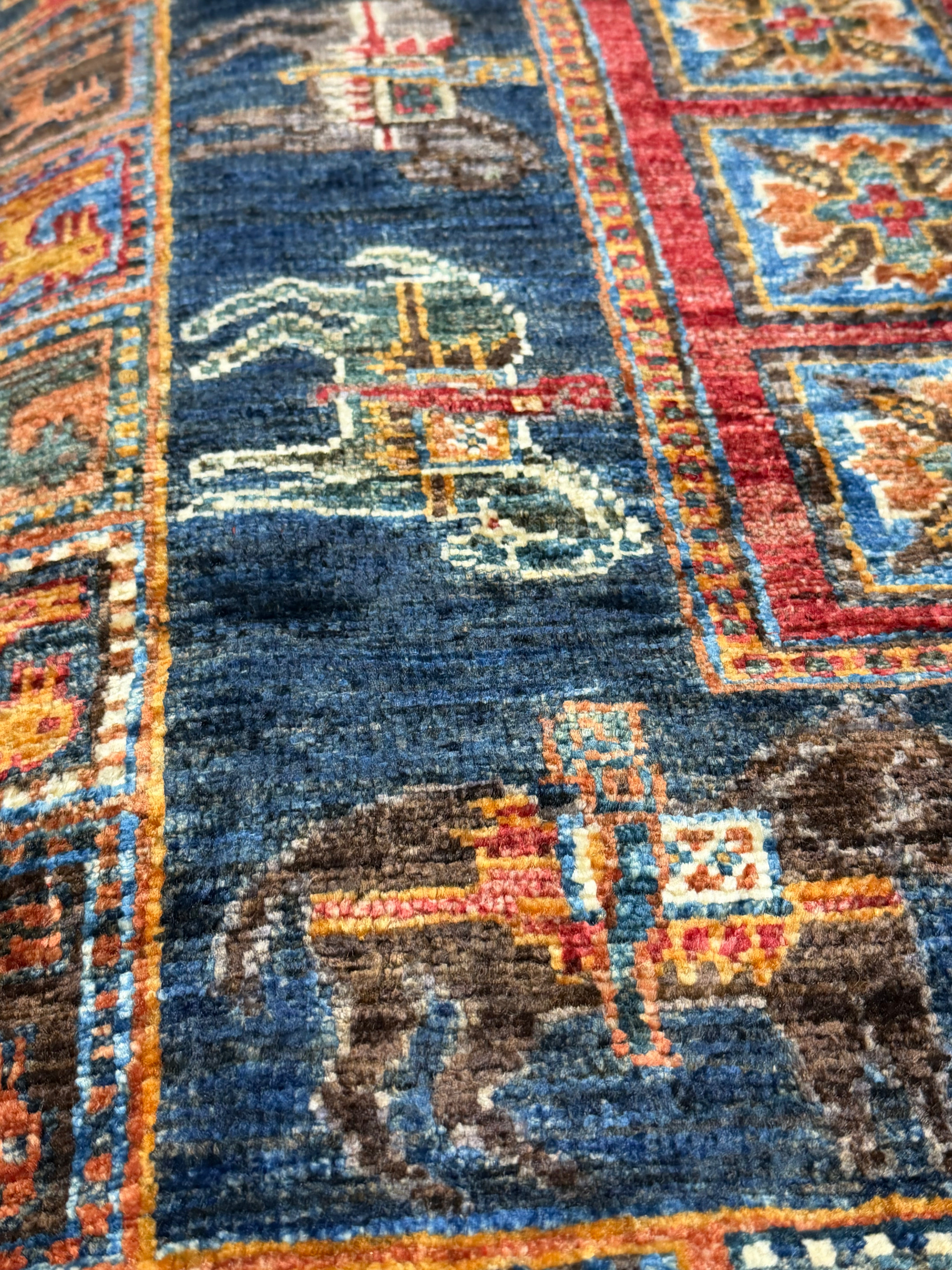 Kristen Maxwell 2.11x4.2 Red Afghani Animal Rug