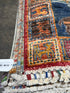 Kristen Maxwell 2.11x4.2 Red Afghani Animal Rug