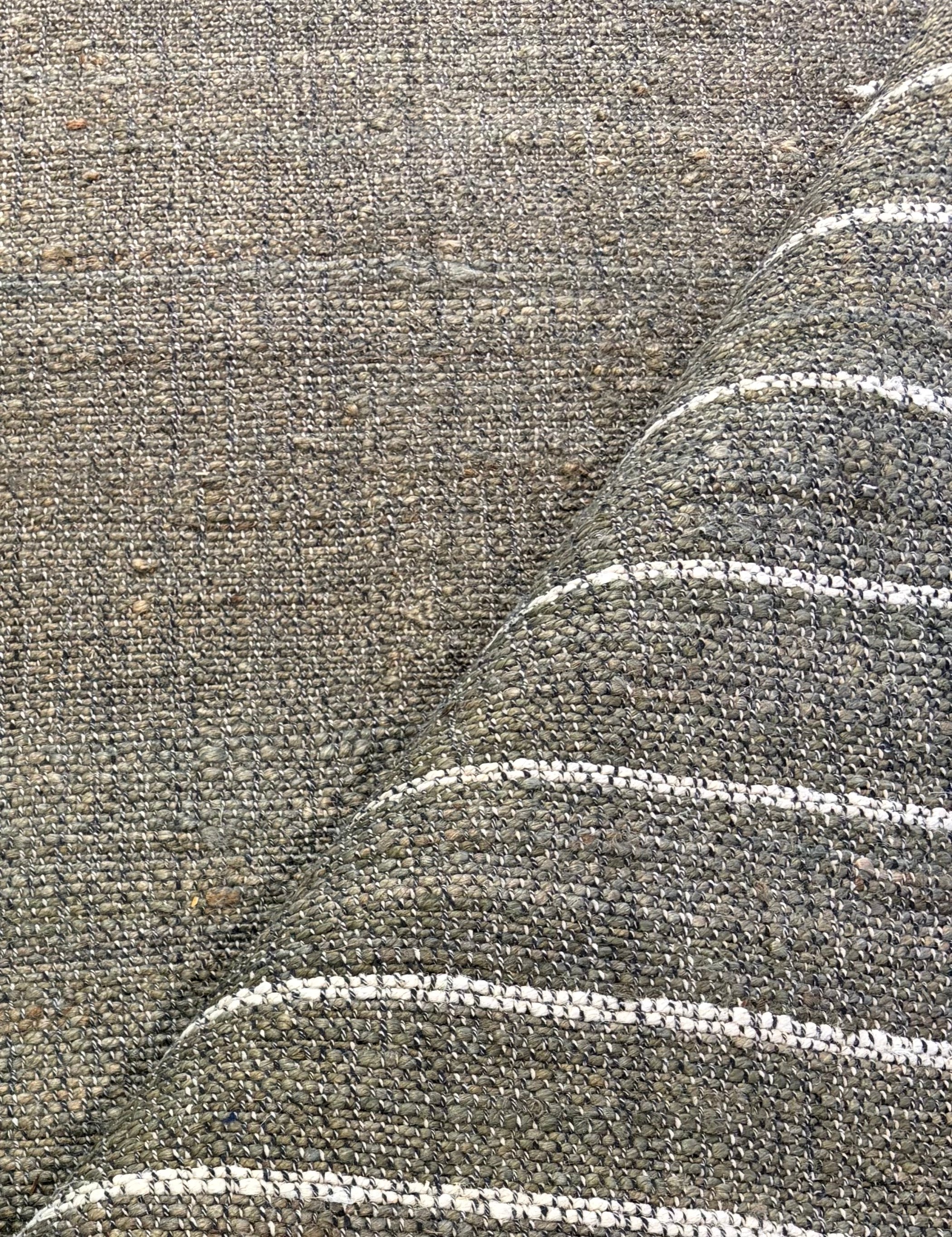 News on Wheels Model Jenna 8x10.3 Handwoven Jute Rug
