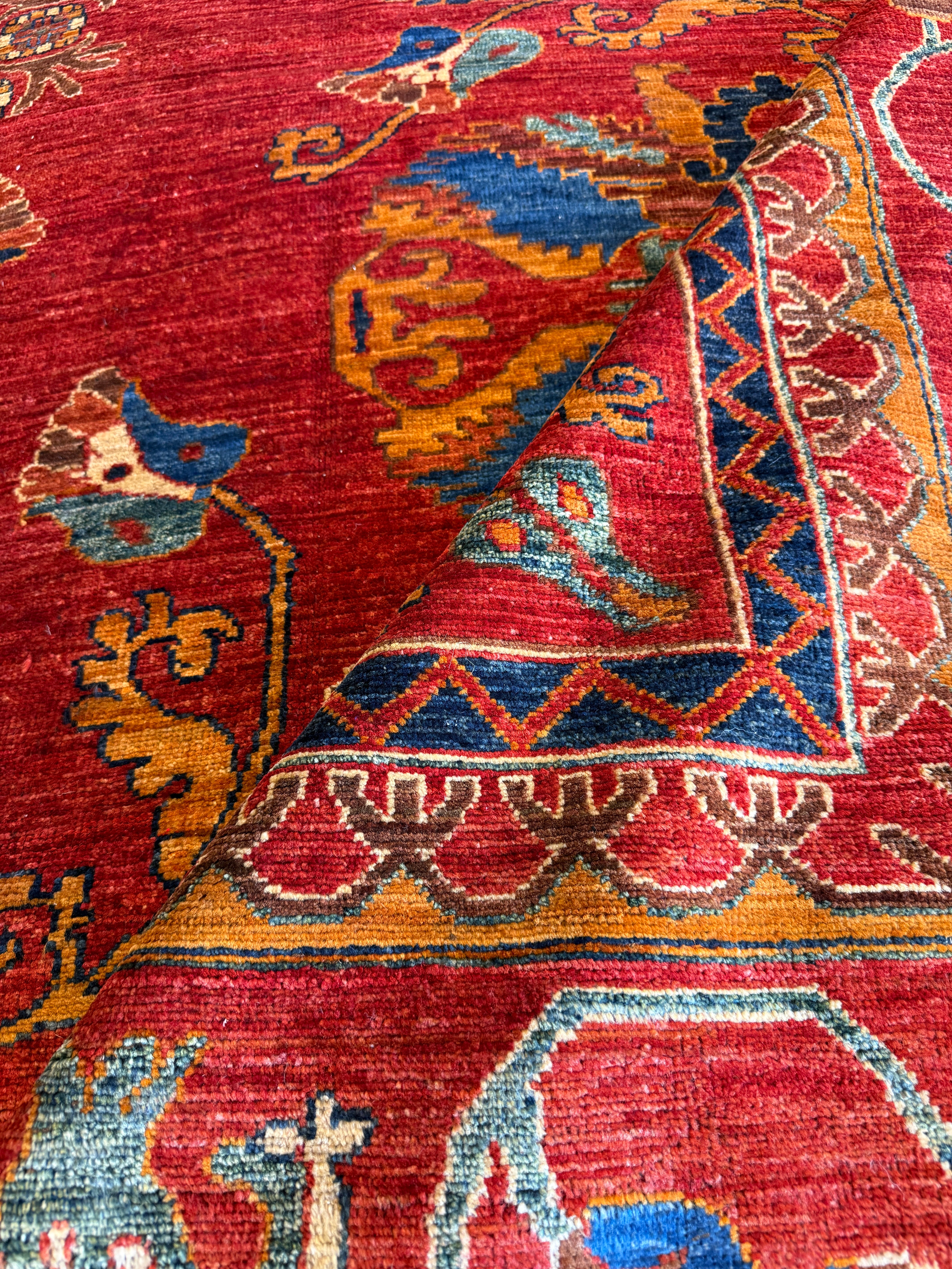 Lettie Mae 10.3x13.10 Red and Blue Hand-Knotted Nomadic Caucasian Humna Wool Rug