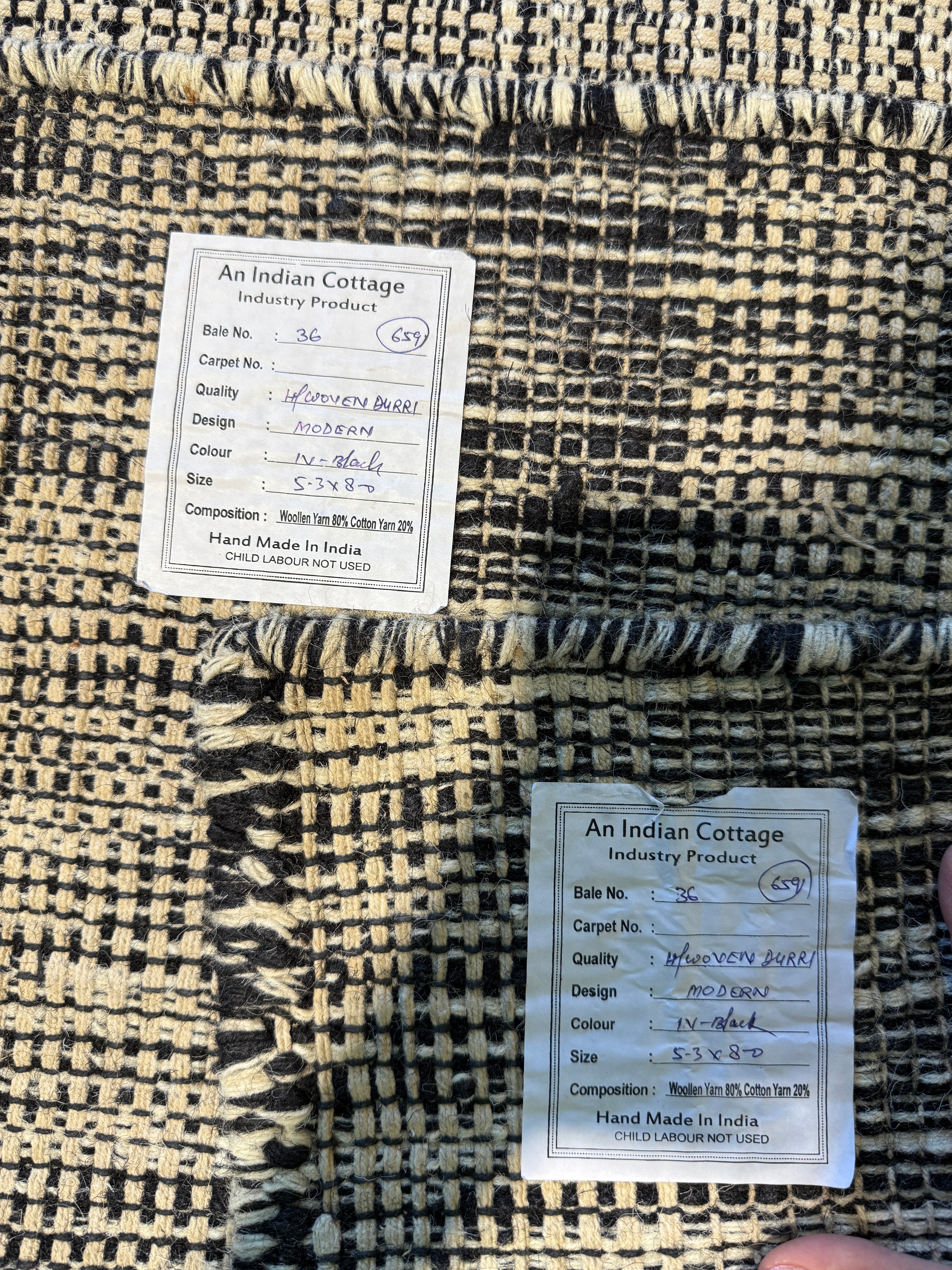 Henrie Moller 5.3x8 Handwoven Black Durrie